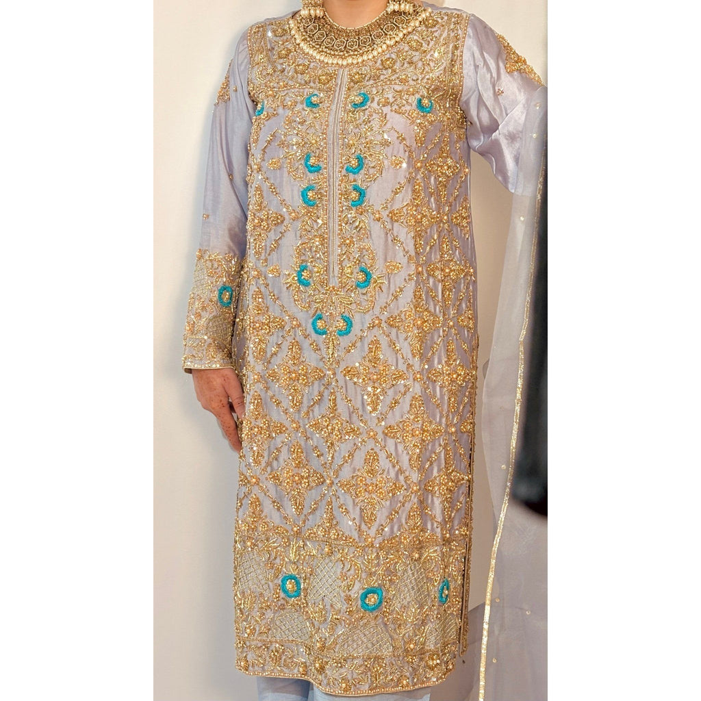 • Clothing: Embroidered/Printed suit for women - Made of best quality fabric - lawn or linen or chiffon - pure silk - Available at Najma Designs & Co. • Jewelry: Gold - plated stud earrings for
