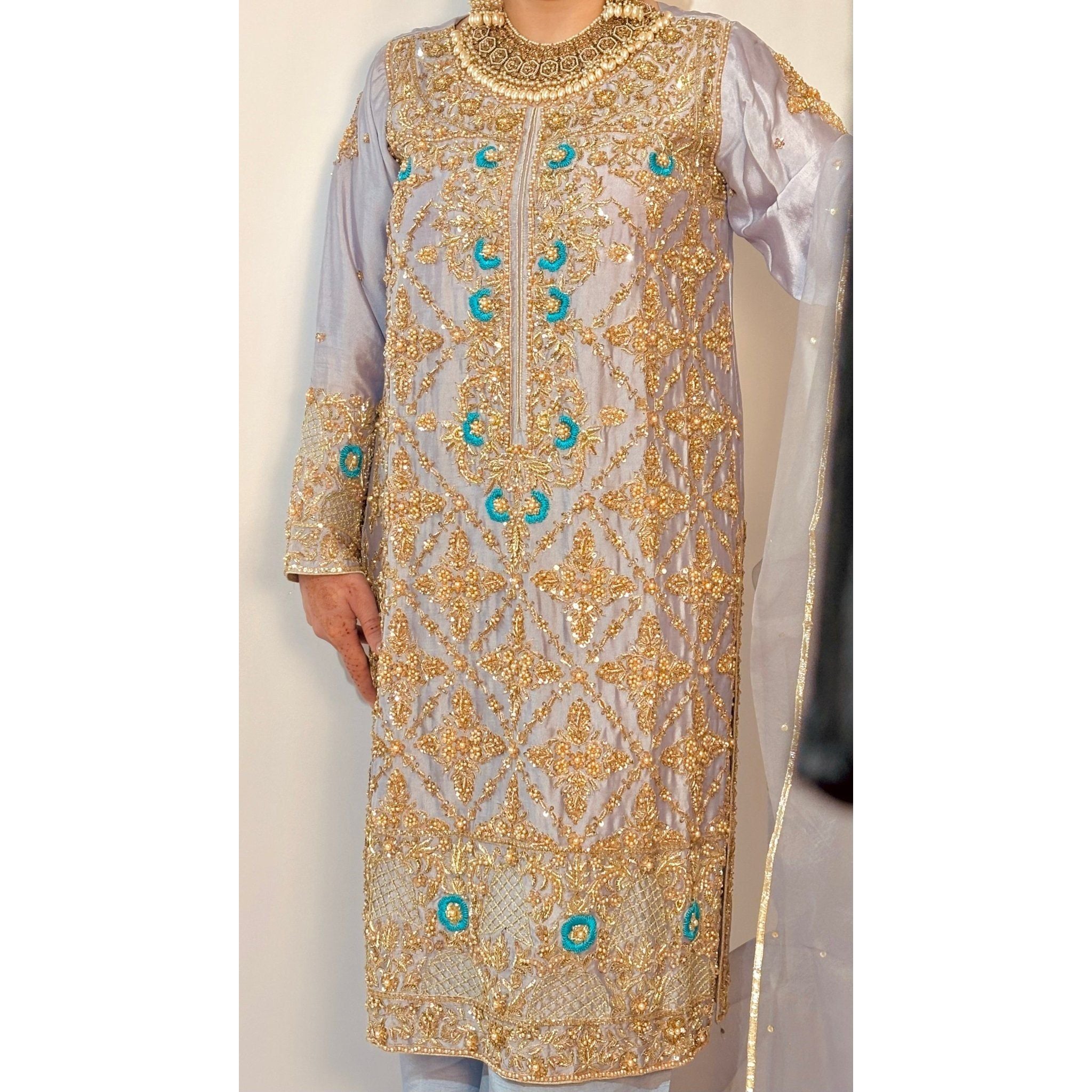 • Clothing: Embroidered/Printed suit for women - Made of best quality fabric - lawn or linen or chiffon - pure silk - Available at Najma Designs & Co. • Jewelry: Gold - plated stud earrings for