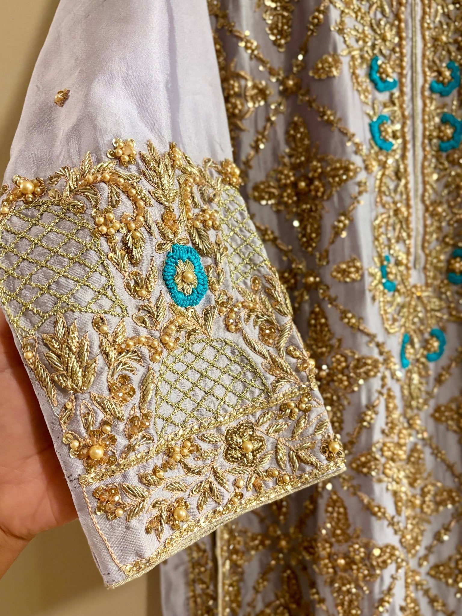 • Clothing: Embroidered/Printed suit for women - Made of best quality fabric - lawn or linen or chiffon - pure silk - Available at Najma Designs & Co. • Jewelry: Gold - plated stud earrings for