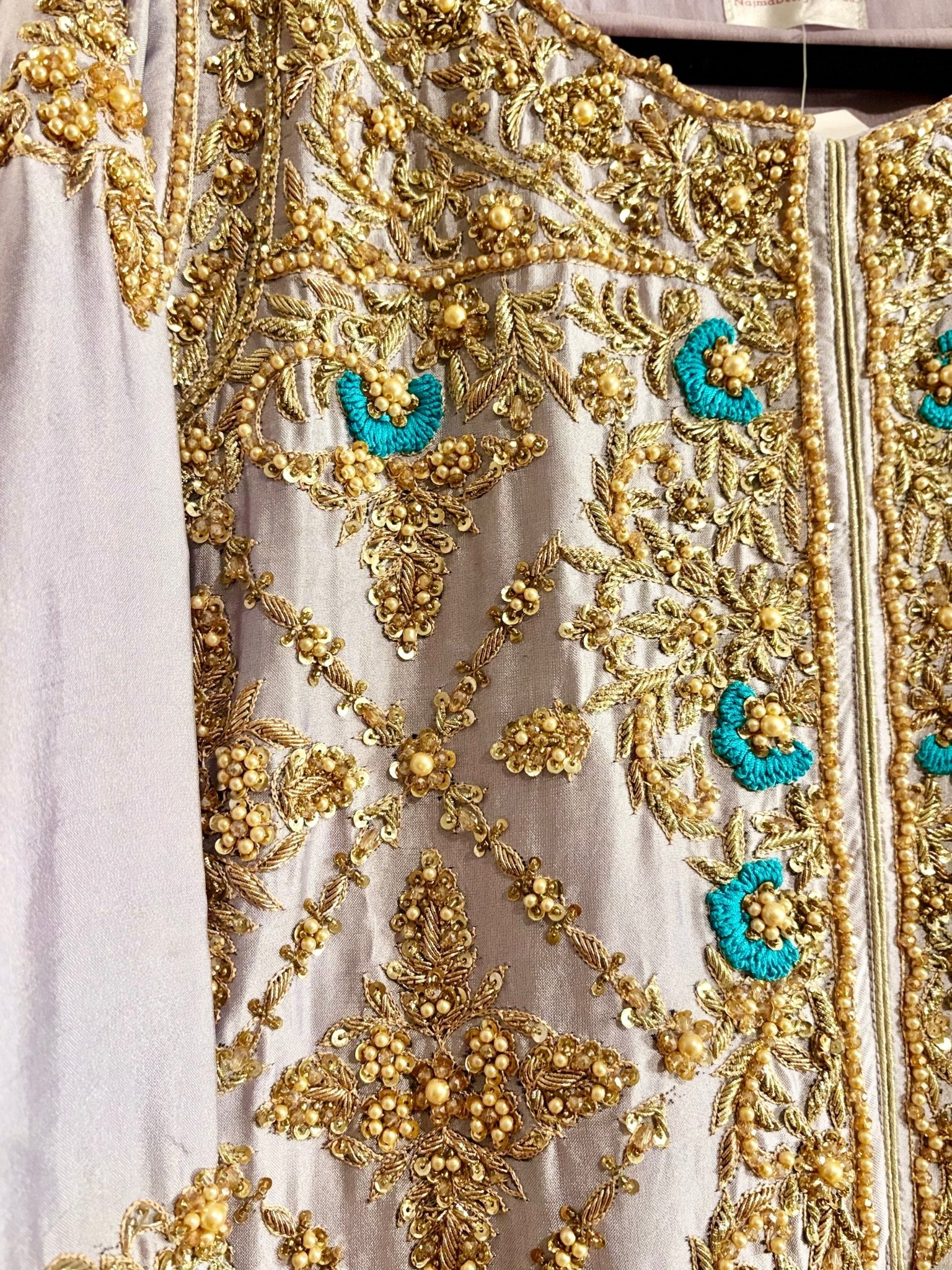 • Clothing: Embroidered/Printed suit for women - Made of best quality fabric - lawn or linen or chiffon - pure silk - Available at Najma Designs & Co. • Jewelry: Gold - plated stud earrings for