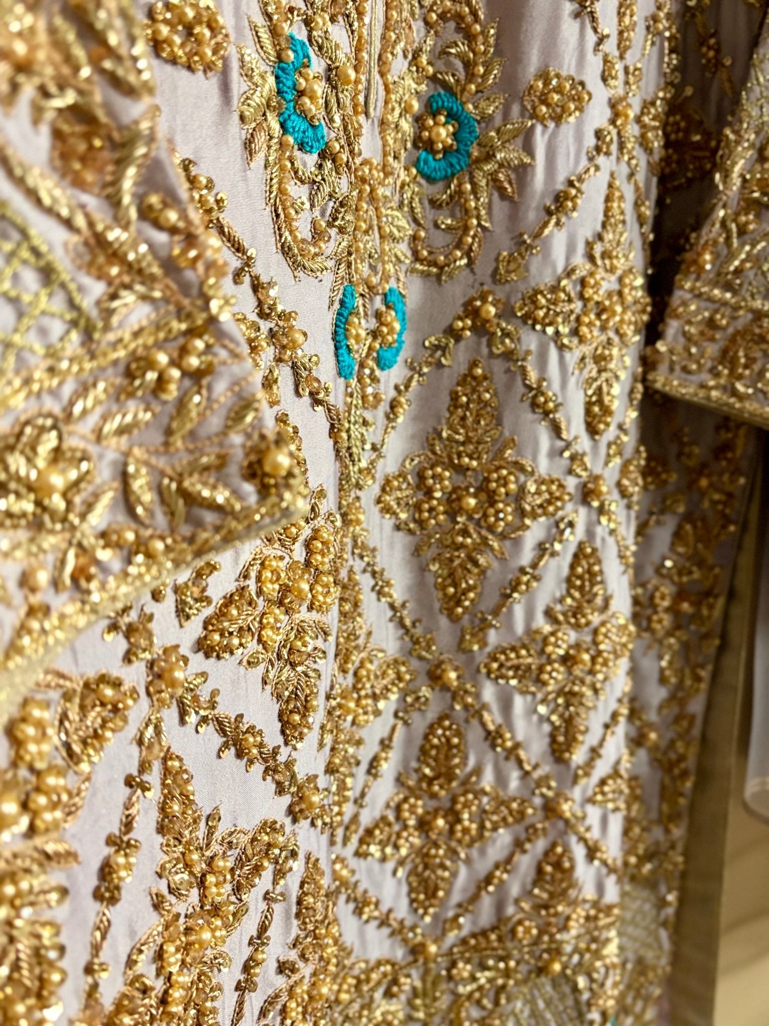 • Clothing: Embroidered/Printed suit for women - Made of best quality fabric - lawn or linen or chiffon - pure silk - Available at Najma Designs & Co. • Jewelry: Gold - plated stud earrings for