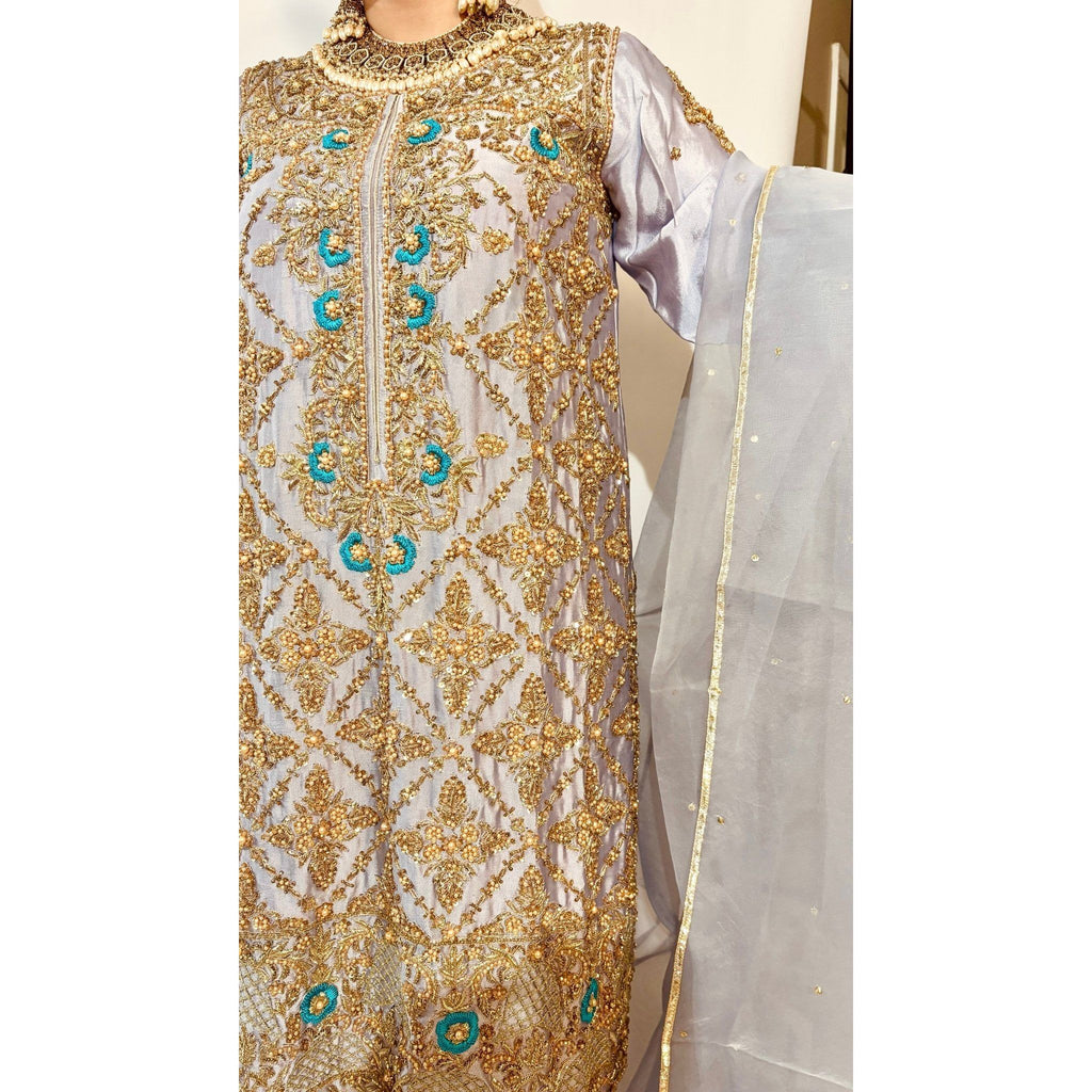 • Clothing: Embroidered/Printed suit for women - Made of best quality fabric - lawn or linen or chiffon - pure silk - Available at Najma Designs & Co. • Jewelry: Gold - plated stud earrings for