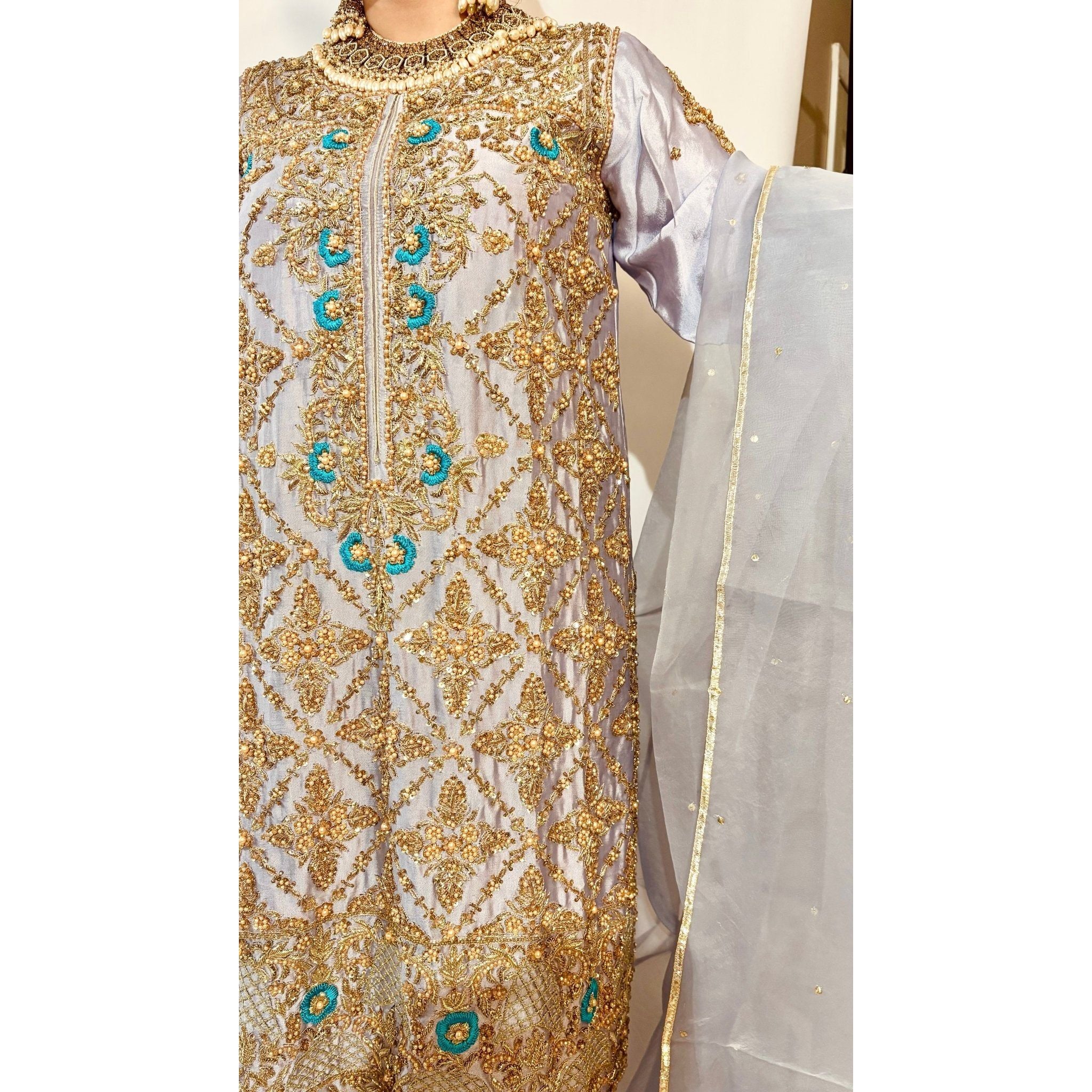• Clothing: Embroidered/Printed suit for women - Made of best quality fabric - lawn or linen or chiffon - pure silk - Available at Najma Designs & Co. • Jewelry: Gold - plated stud earrings for