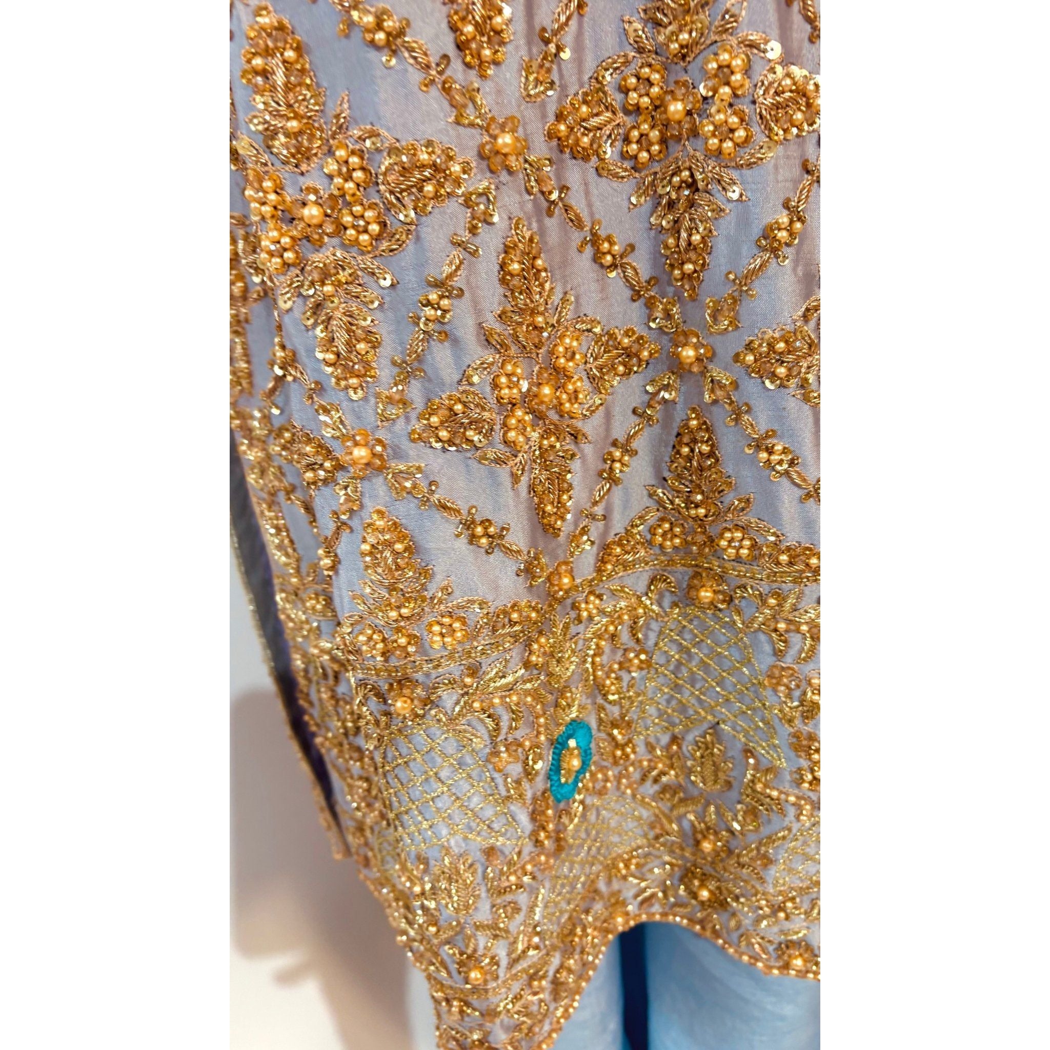 • Clothing: Embroidered/Printed suit for women - Made of best quality fabric - lawn or linen or chiffon - pure silk - Available at Najma Designs & Co. • Jewelry: Gold - plated stud earrings for