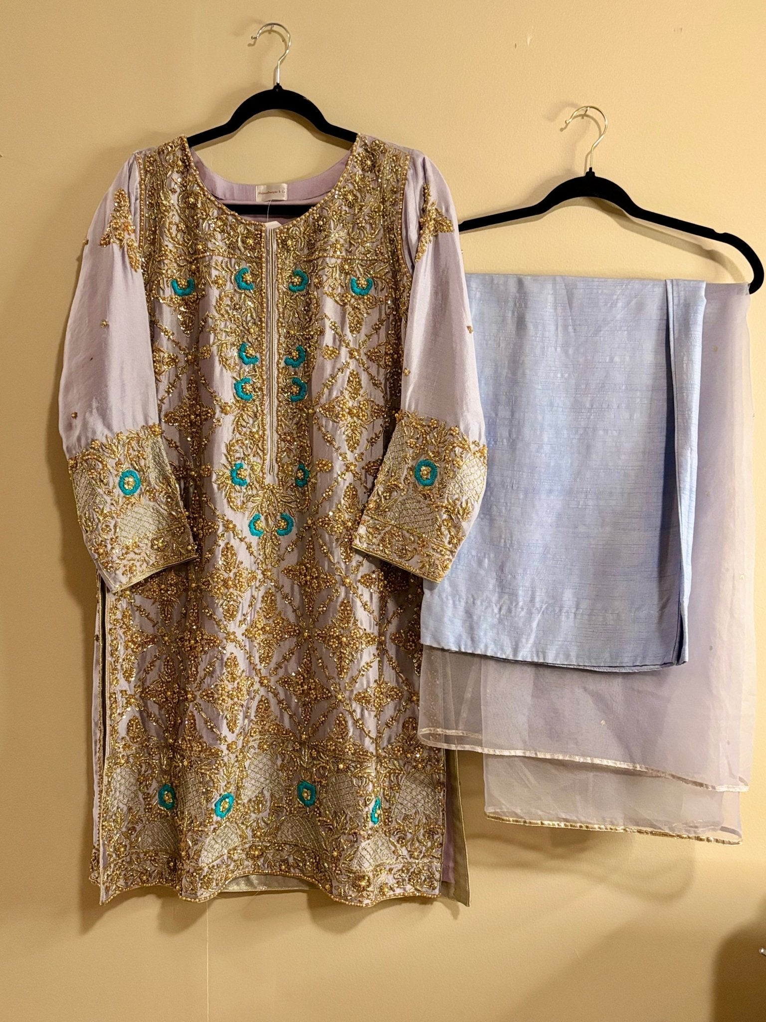 • Clothing: Embroidered/Printed suit for women - Made of best quality fabric - lawn or linen or chiffon - pure silk - Available at Najma Designs & Co. • Jewelry: Gold - plated stud earrings for