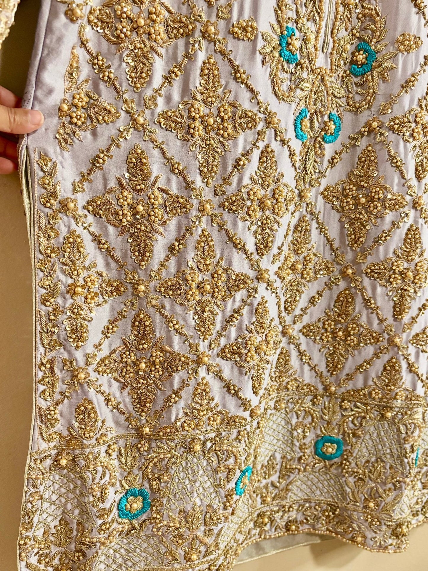 • Clothing: Embroidered/Printed suit for women - Made of best quality fabric - lawn or linen or chiffon - pure silk - Available at Najma Designs & Co. • Jewelry: Gold - plated stud earrings for