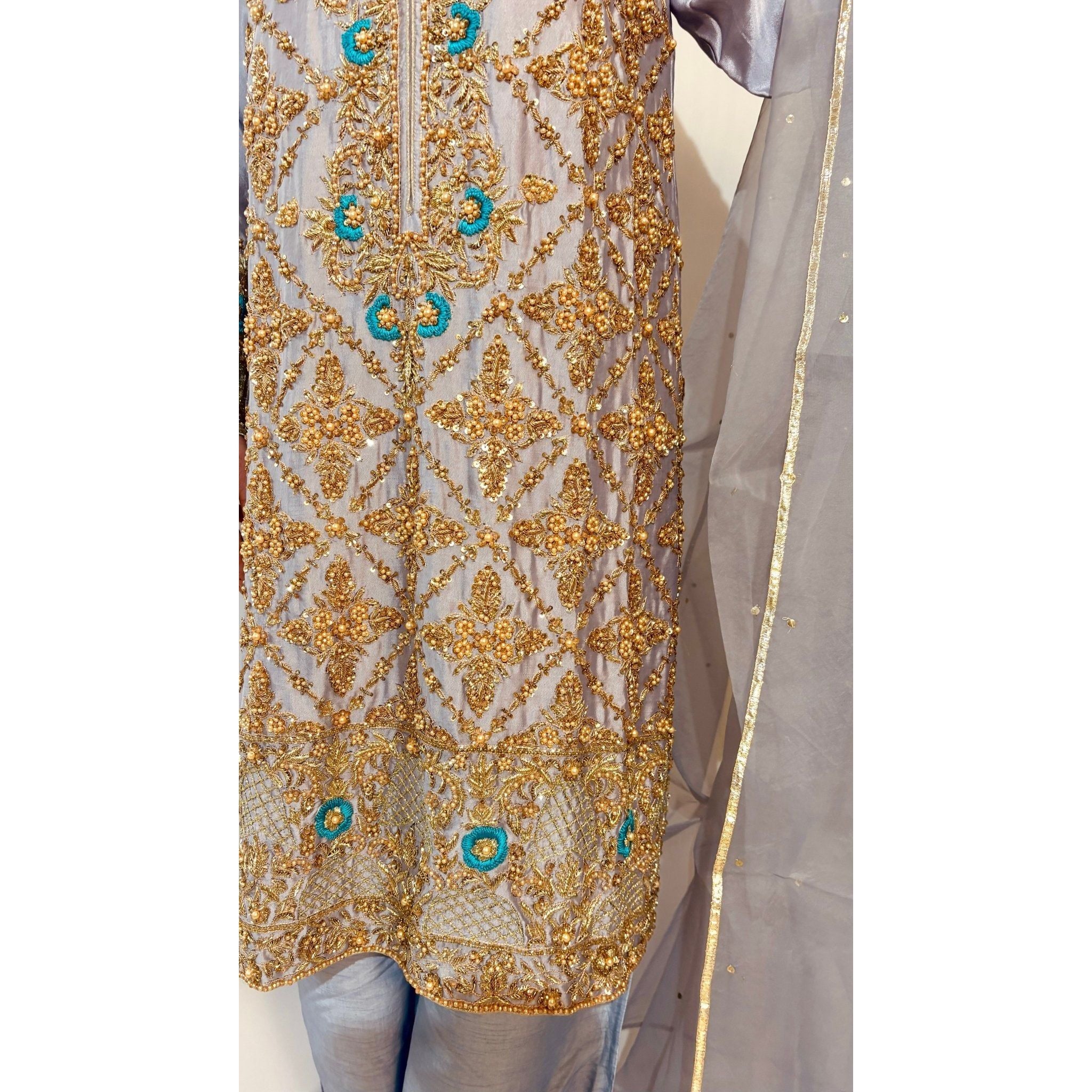 • Clothing: Embroidered/Printed suit for women - Made of best quality fabric - lawn or linen or chiffon - pure silk - Available at Najma Designs & Co. • Jewelry: Gold - plated stud earrings for