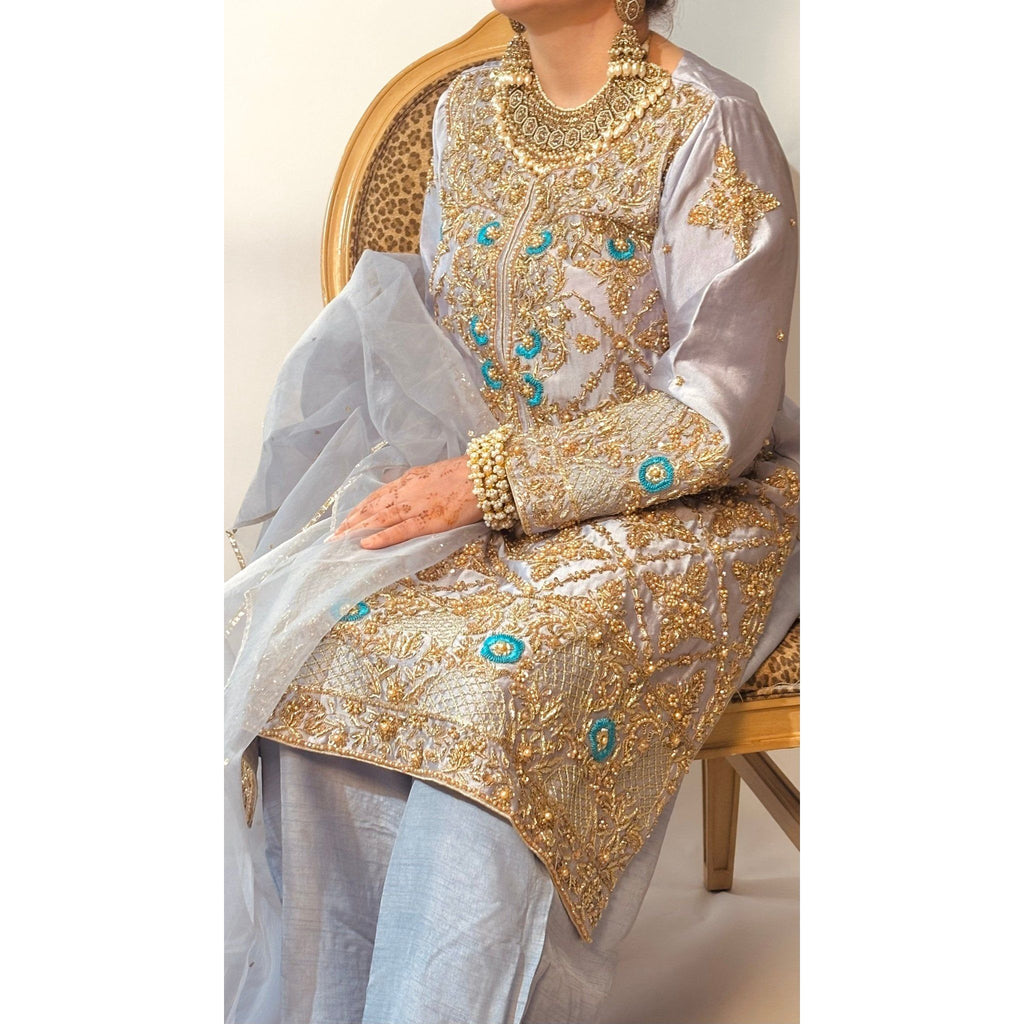 • Clothing: Embroidered/Printed suit for women - Made of best quality fabric - lawn or linen or chiffon - pure silk - Available at Najma Designs & Co. • Jewelry: Gold - plated stud earrings for