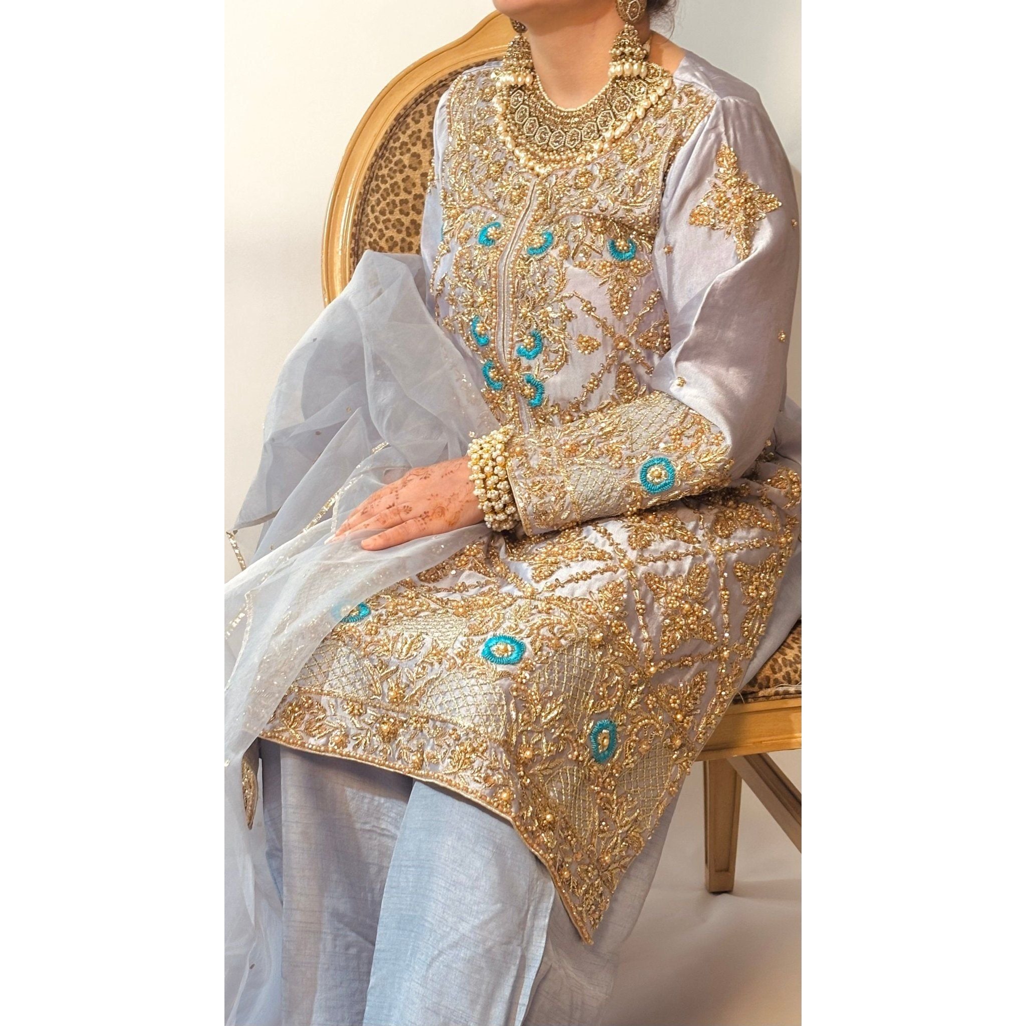 • Clothing: Embroidered/Printed suit for women - Made of best quality fabric - lawn or linen or chiffon - pure silk - Available at Najma Designs & Co. • Jewelry: Gold - plated stud earrings for