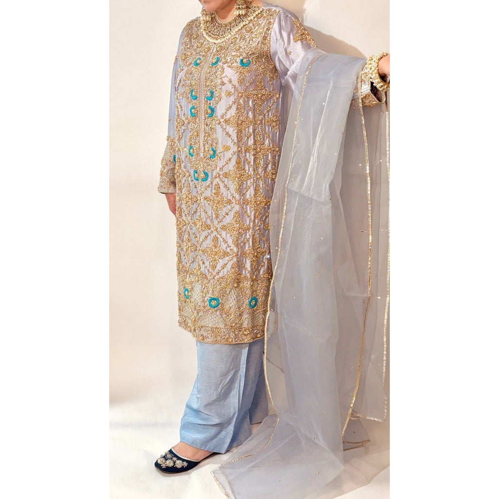 • Clothing: Embroidered/Printed suit for women - Made of best quality fabric - lawn or linen or chiffon - pure silk - Available at Najma Designs & Co. • Jewelry: Gold - plated stud earrings for
