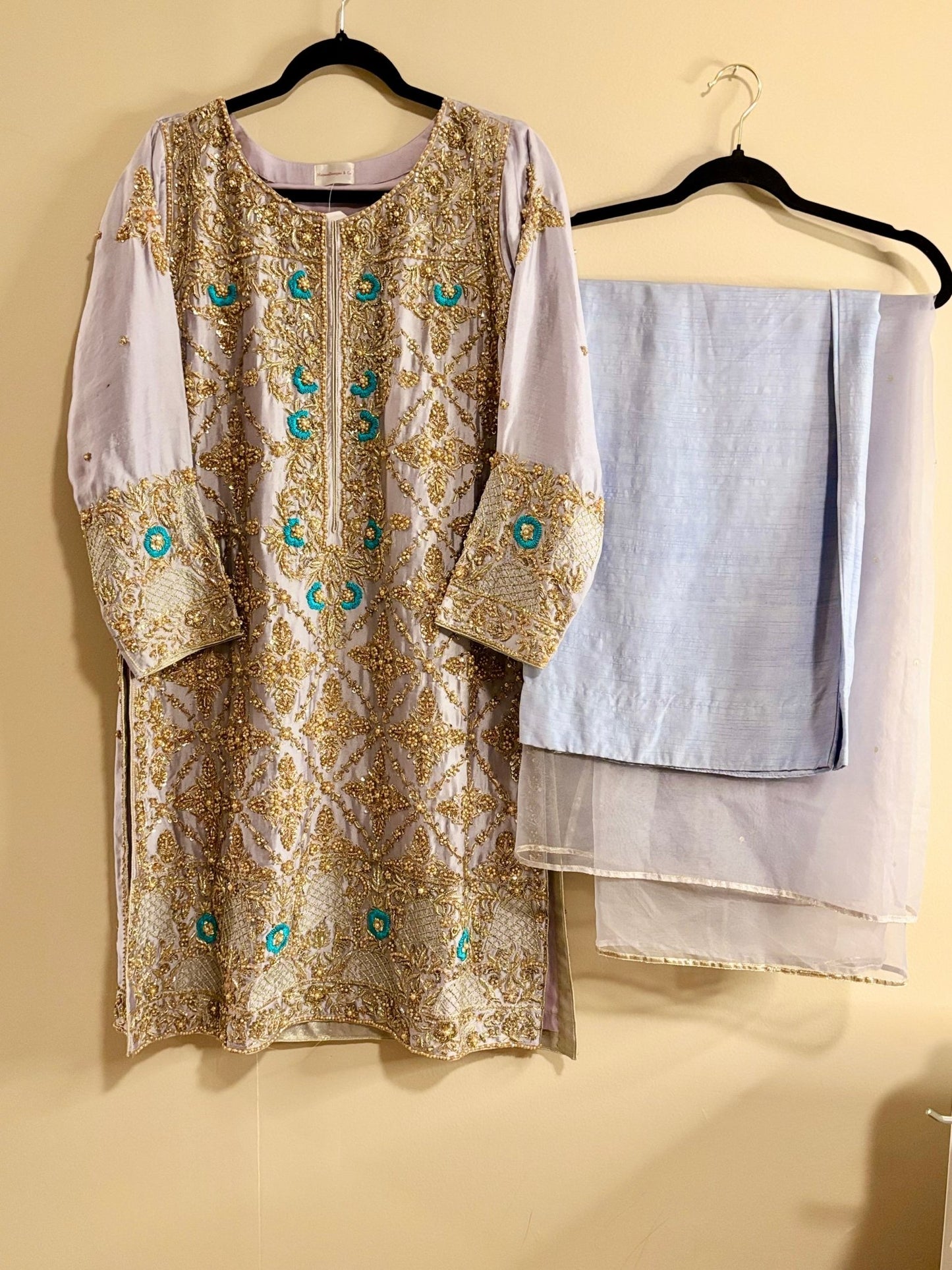 • Clothing: Embroidered/Printed suit for women - Made of best quality fabric - lawn or linen or chiffon - pure silk - Available at Najma Designs & Co. • Jewelry: Gold - plated stud earrings for