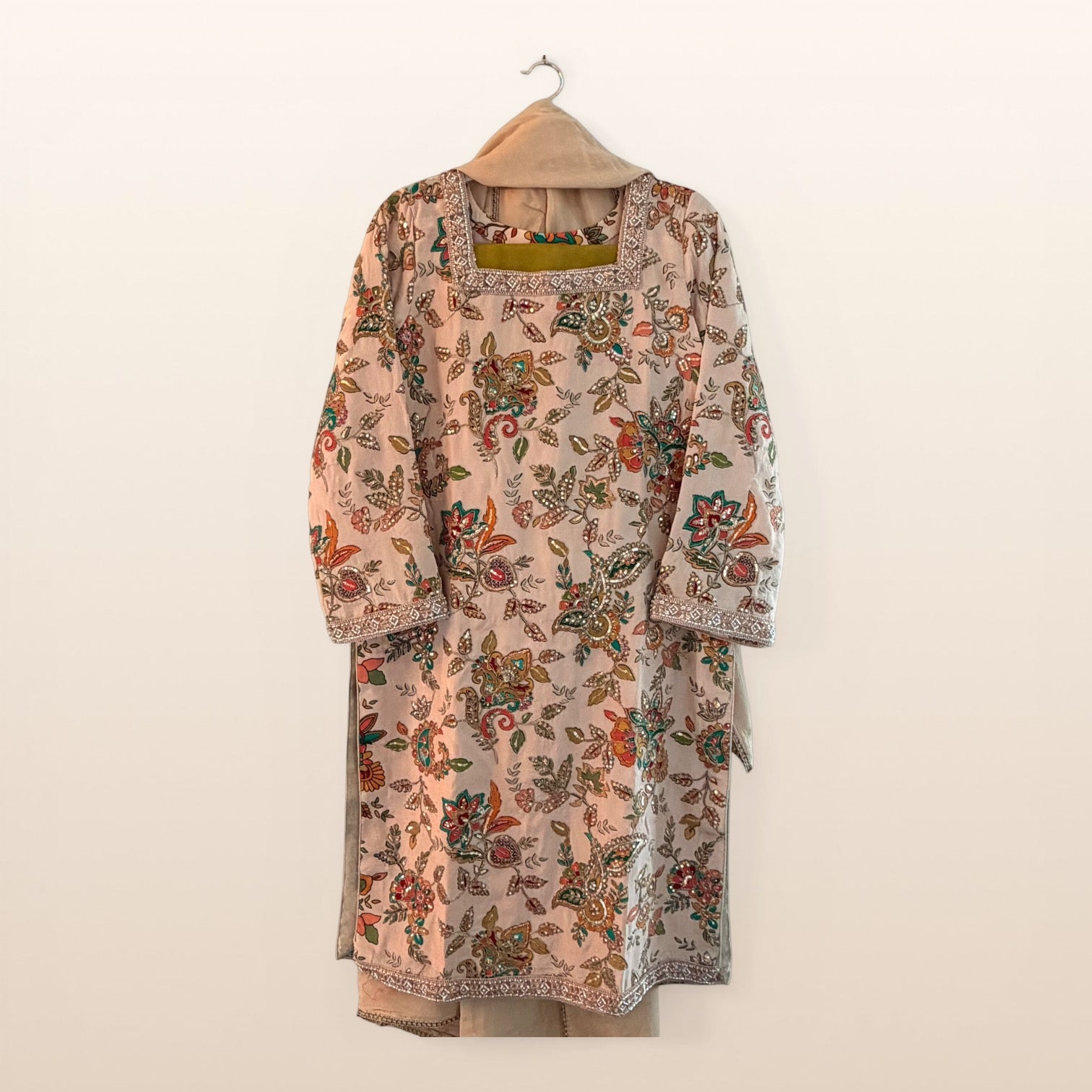 • Clothing: Embroidered/Printed suit for women - Made of best quality fabric - lawn or linen or chiffon - pure silk - Available at Najma Designs & Co. • Jewelry: Gold - plated stud earrings for