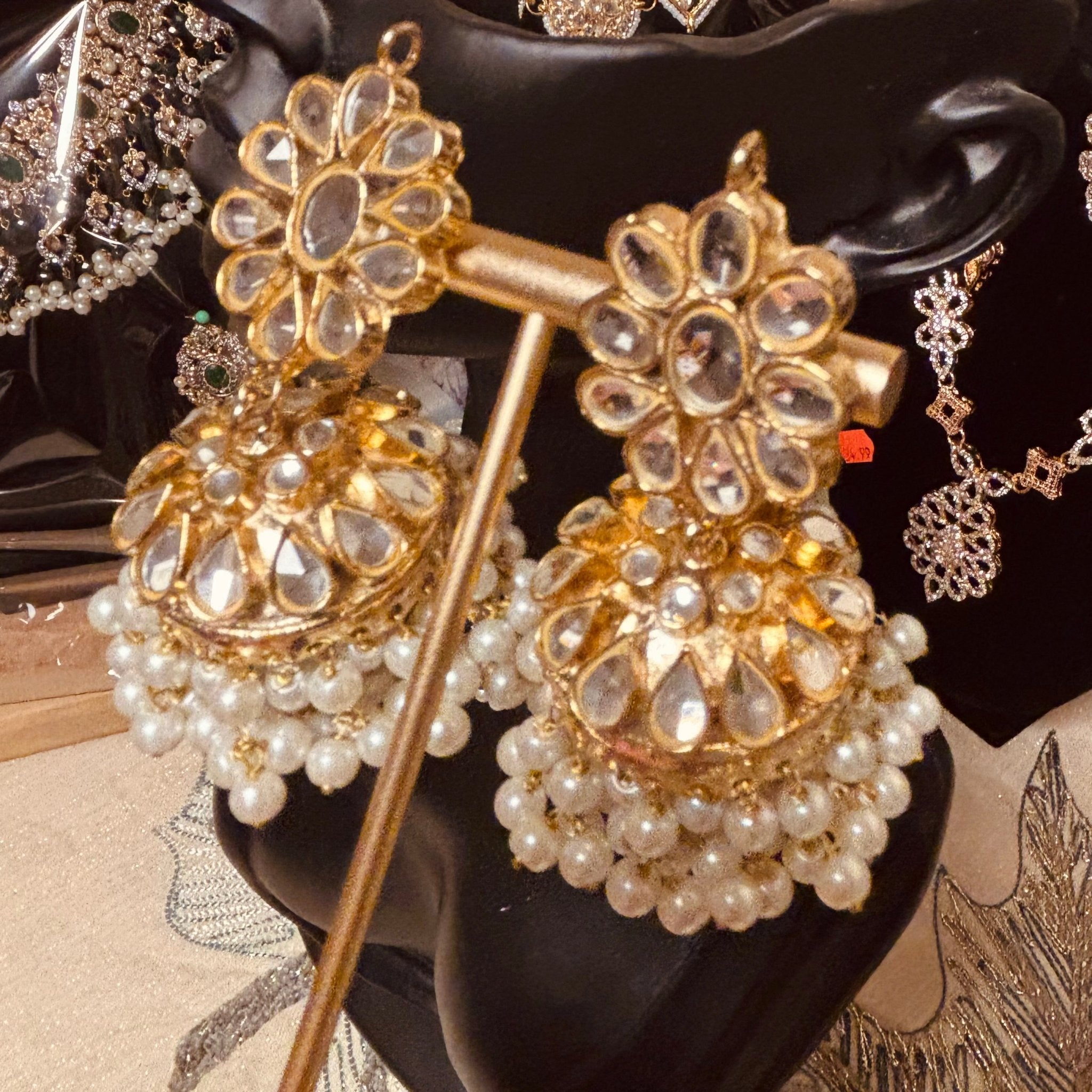 • Clothing: Embroidered/Printed suit for women - Made of best quality fabric - lawn or linen or chiffon - pure silk - Available at Najma Designs & Co. • Jewelry: Gold - plated stud earrings for