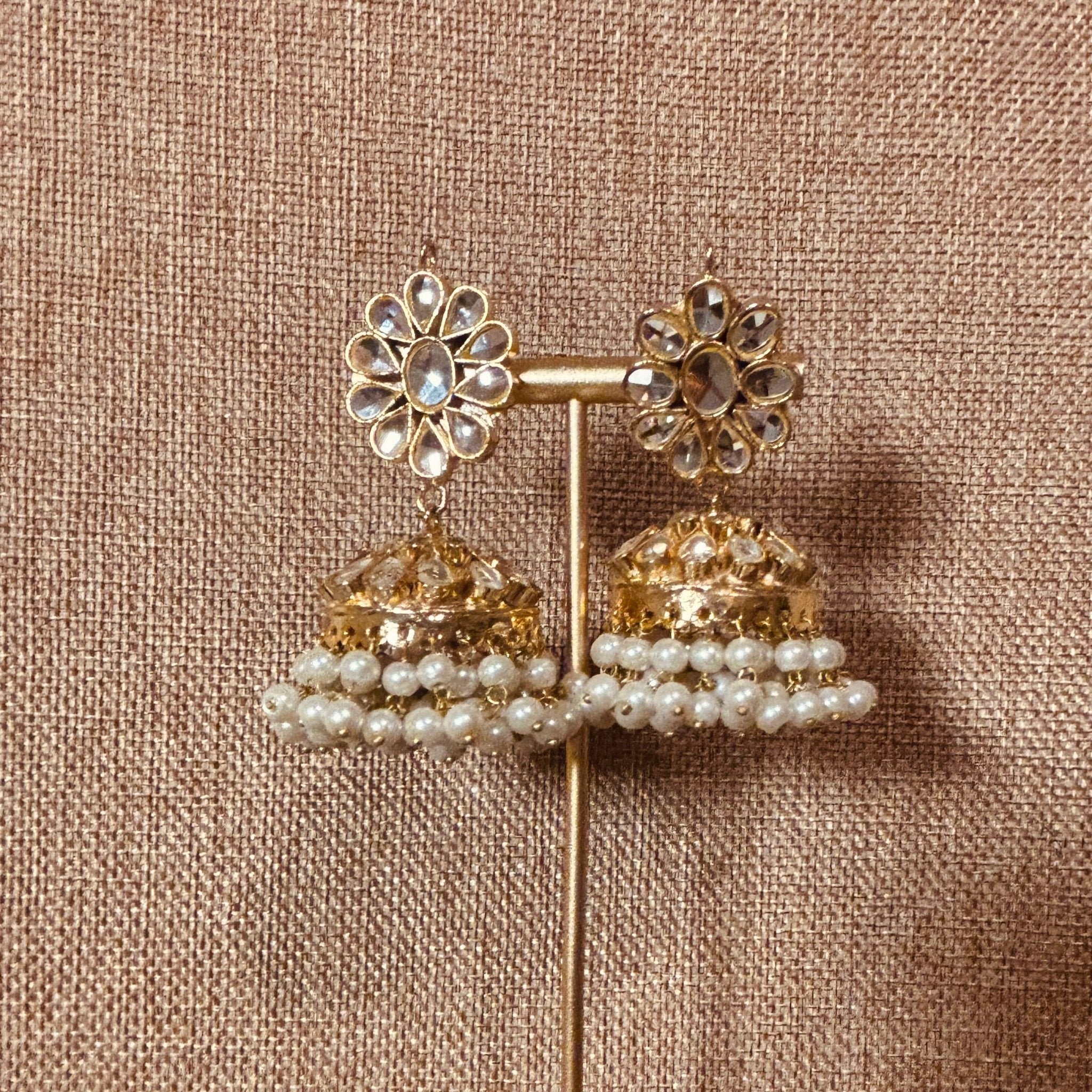 • Clothing: Embroidered/Printed suit for women - Made of best quality fabric - lawn or linen or chiffon - pure silk - Available at Najma Designs & Co. • Jewelry: Gold - plated stud earrings for