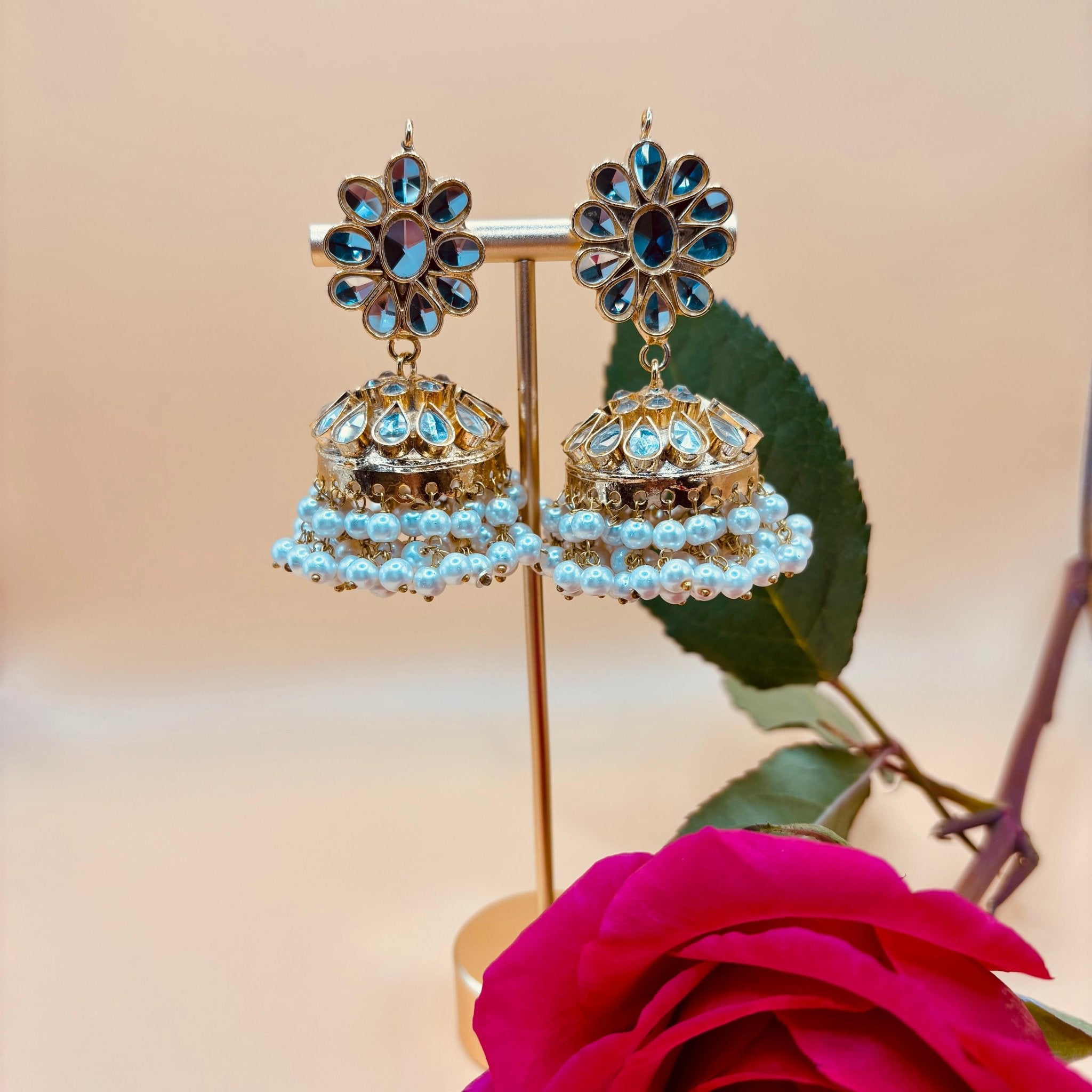 • Clothing: Embroidered/Printed suit for women - Made of best quality fabric - lawn or linen or chiffon - pure silk - Available at Najma Designs & Co. • Jewelry: Gold - plated stud earrings for