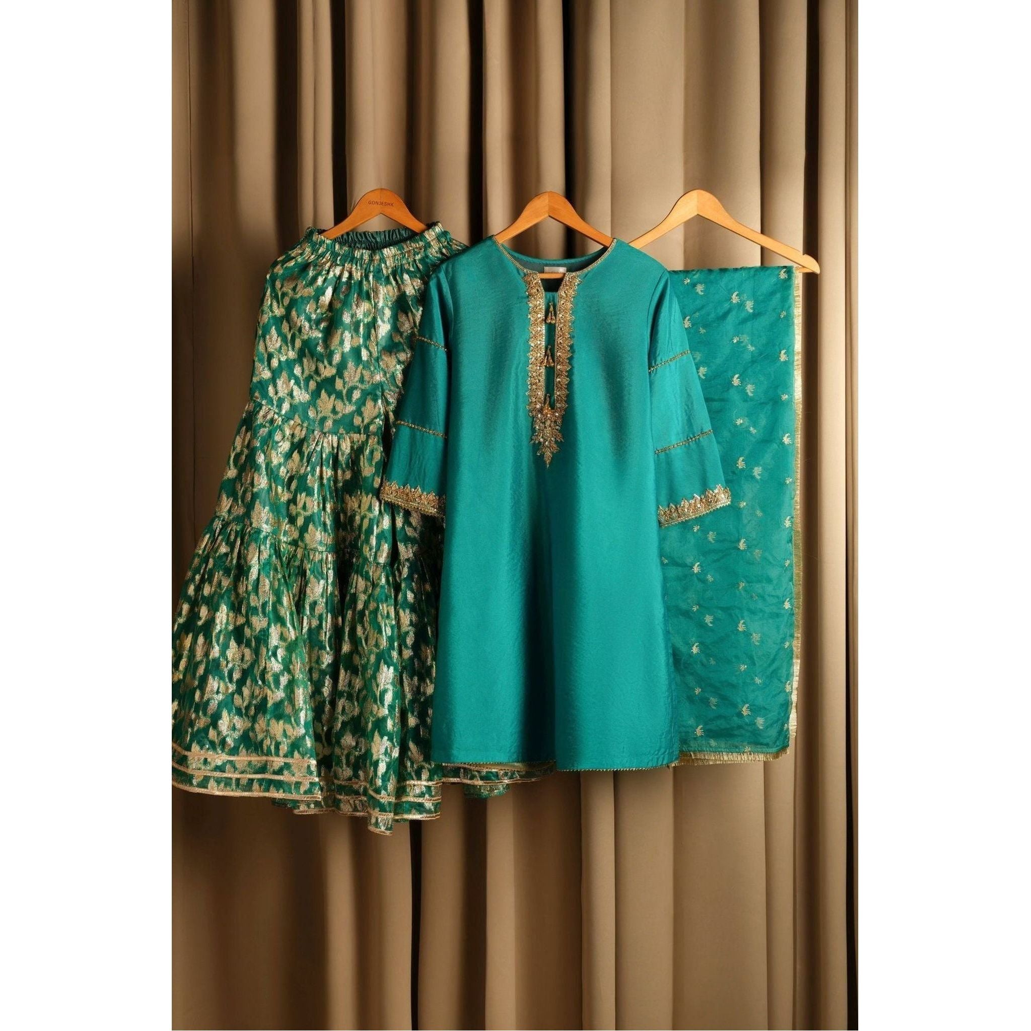 Sea green gharara set with beautiful gld embroidery, shirt dupatta and gharara 