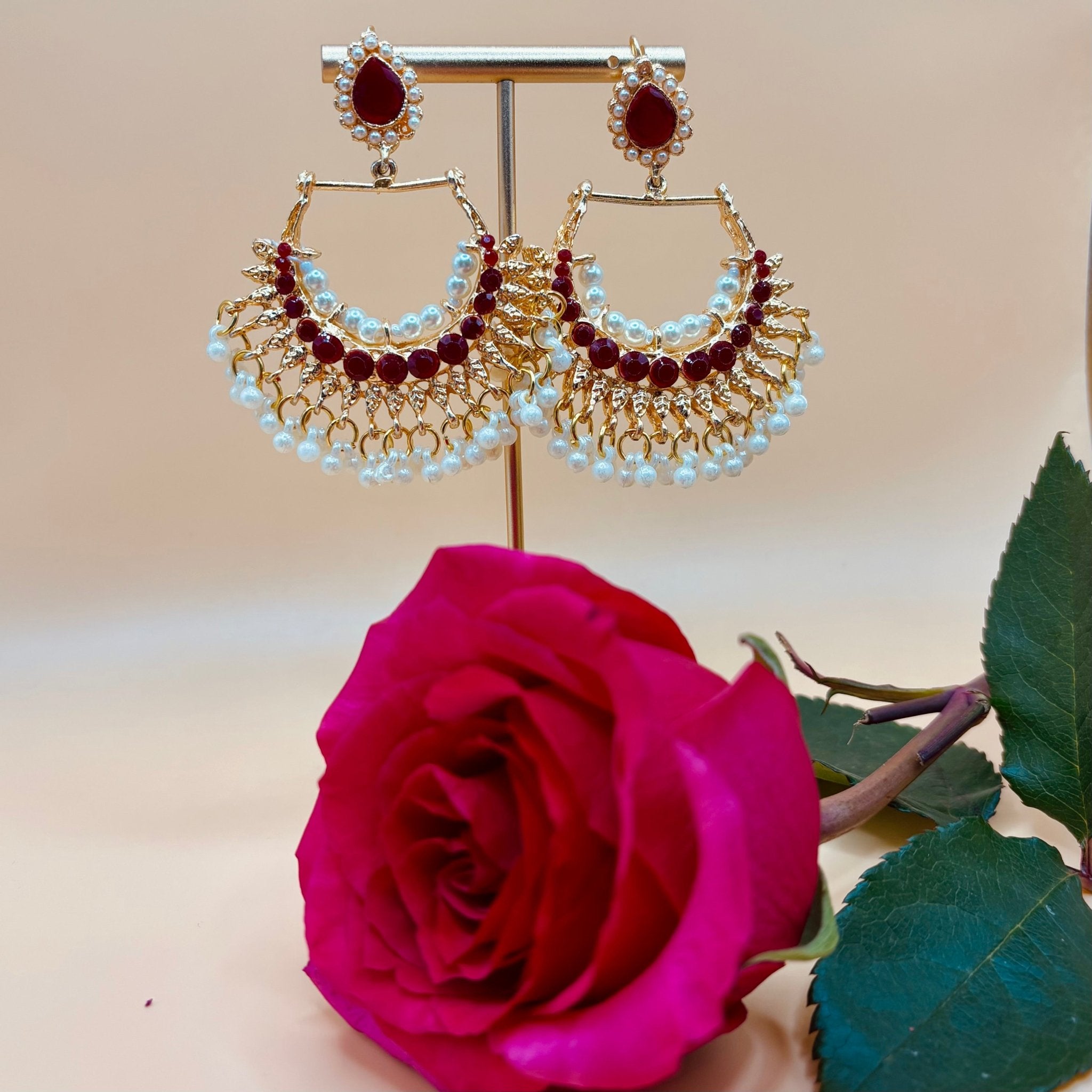 • Clothing: Embroidered/Printed suit for women - Made of best quality fabric - lawn or linen or chiffon - pure silk - Available at Najma Designs & Co. • Jewelry: Gold - plated stud earrings for