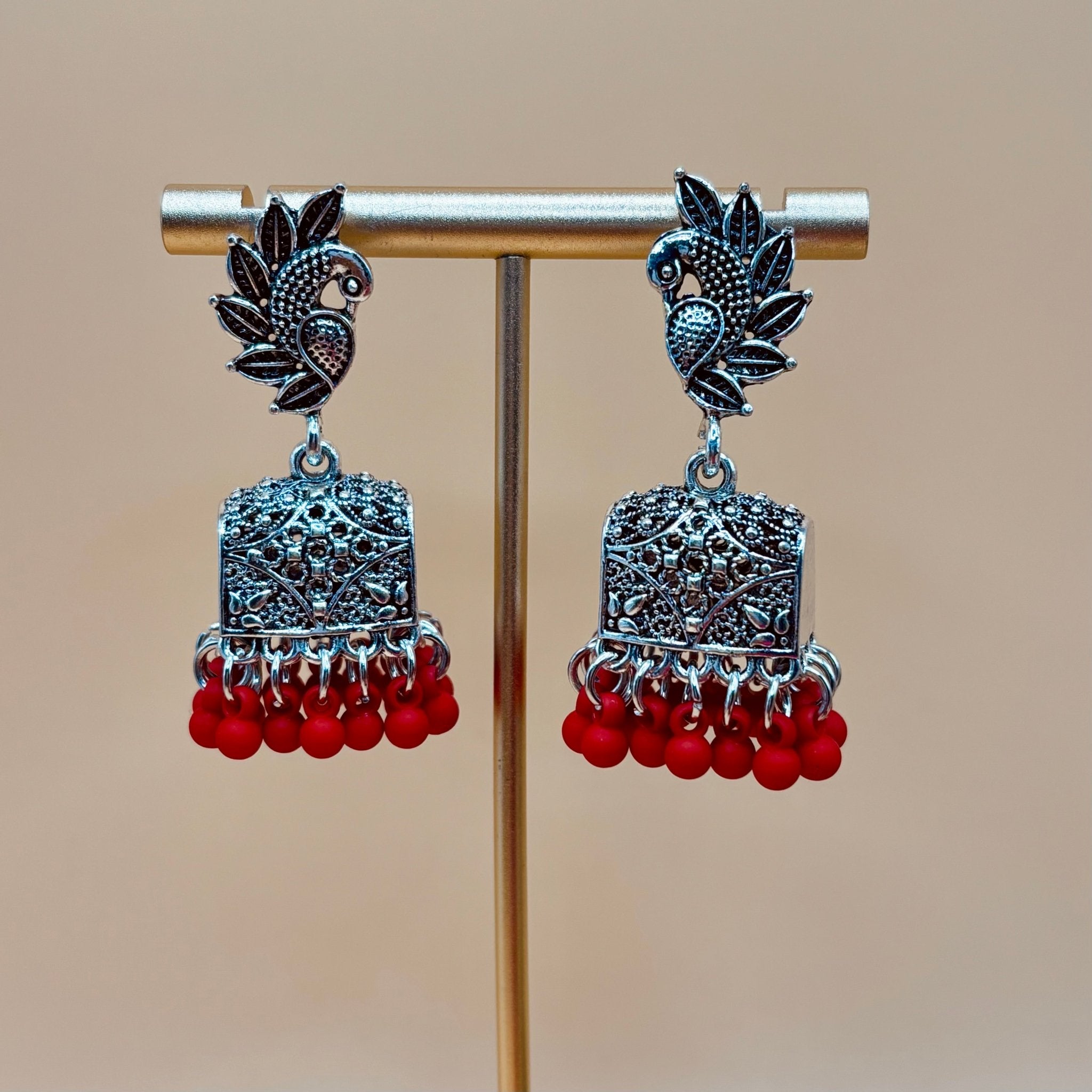 • Clothing: Embroidered/Printed suit for women - Made of best quality fabric - lawn or linen or chiffon - pure silk - Available at Najma Designs & Co. • Jewelry: Gold - plated stud earrings for