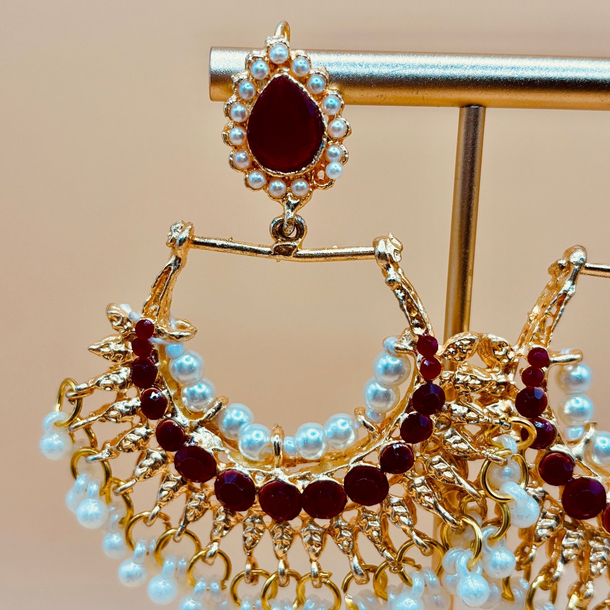 • Clothing: Embroidered/Printed suit for women - Made of best quality fabric - lawn or linen or chiffon - pure silk - Available at Najma Designs & Co. • Jewelry: Gold - plated stud earrings for