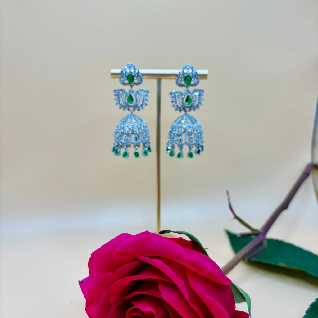 • Clothing: Embroidered/Printed suit for women - Made of best quality fabric - lawn or linen or chiffon - pure silk - Available at Najma Designs & Co. • Jewelry: Gold - plated stud earrings for