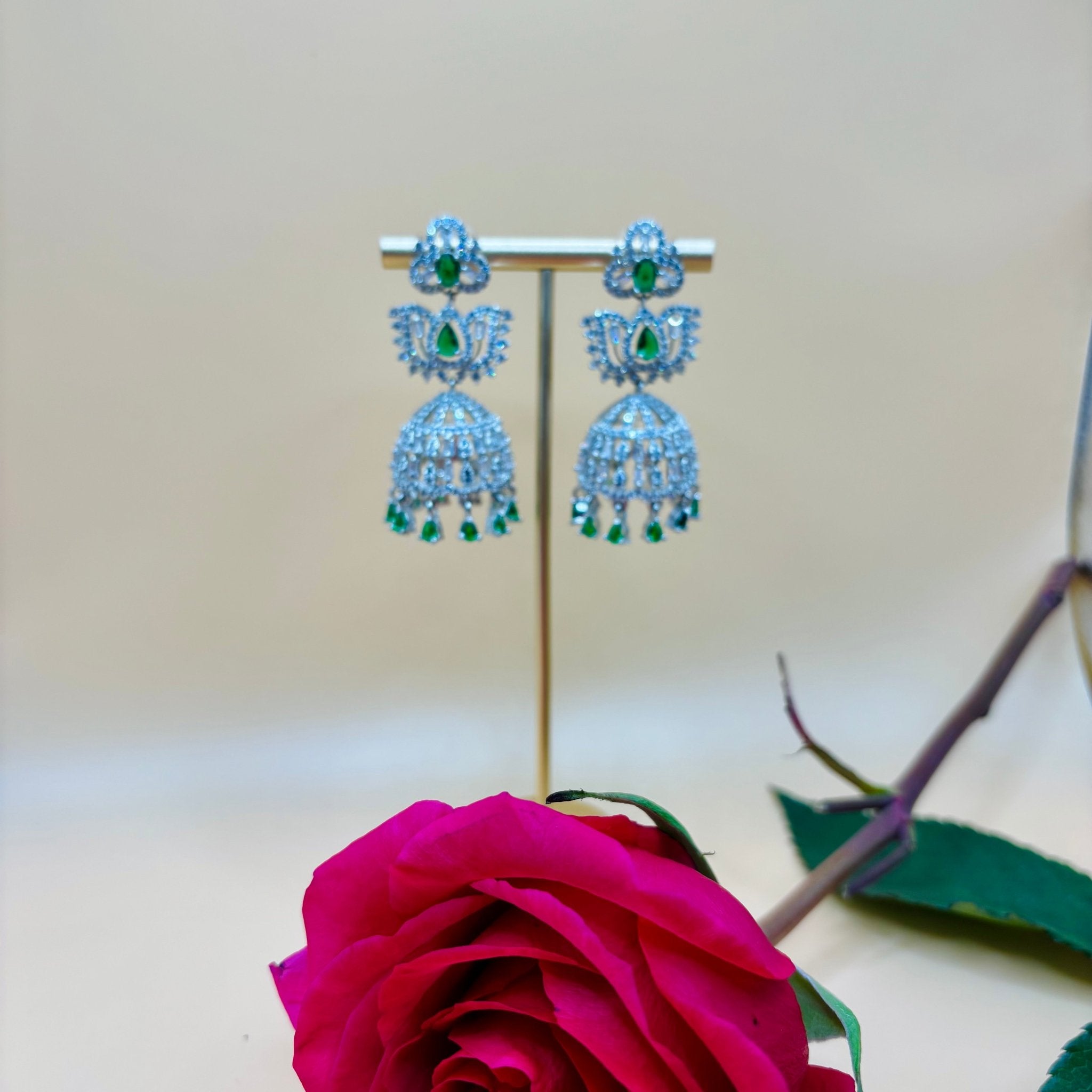 • Clothing: Embroidered/Printed suit for women - Made of best quality fabric - lawn or linen or chiffon - pure silk - Available at Najma Designs & Co. • Jewelry: Gold - plated stud earrings for