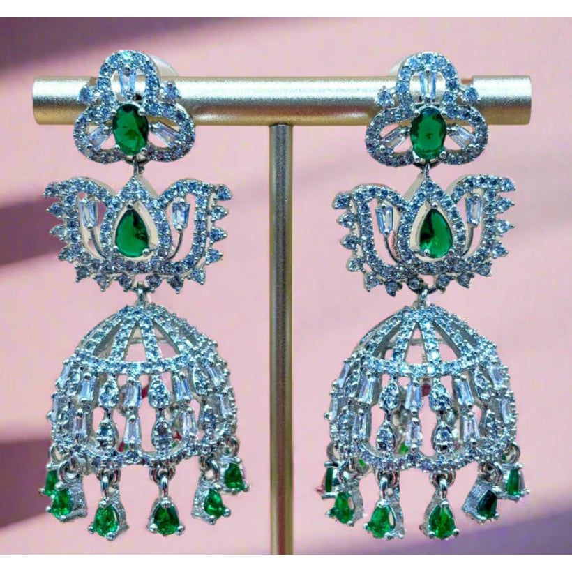 • Clothing: Embroidered/Printed suit for women - Made of best quality fabric - lawn or linen or chiffon - pure silk - Available at Najma Designs & Co. • Jewelry: Gold - plated stud earrings for