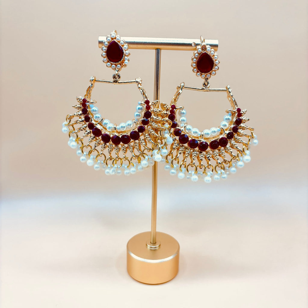 • Clothing: Embroidered/Printed suit for women - Made of best quality fabric - lawn or linen or chiffon - pure silk - Available at Najma Designs & Co. • Jewelry: Gold - plated stud earrings for