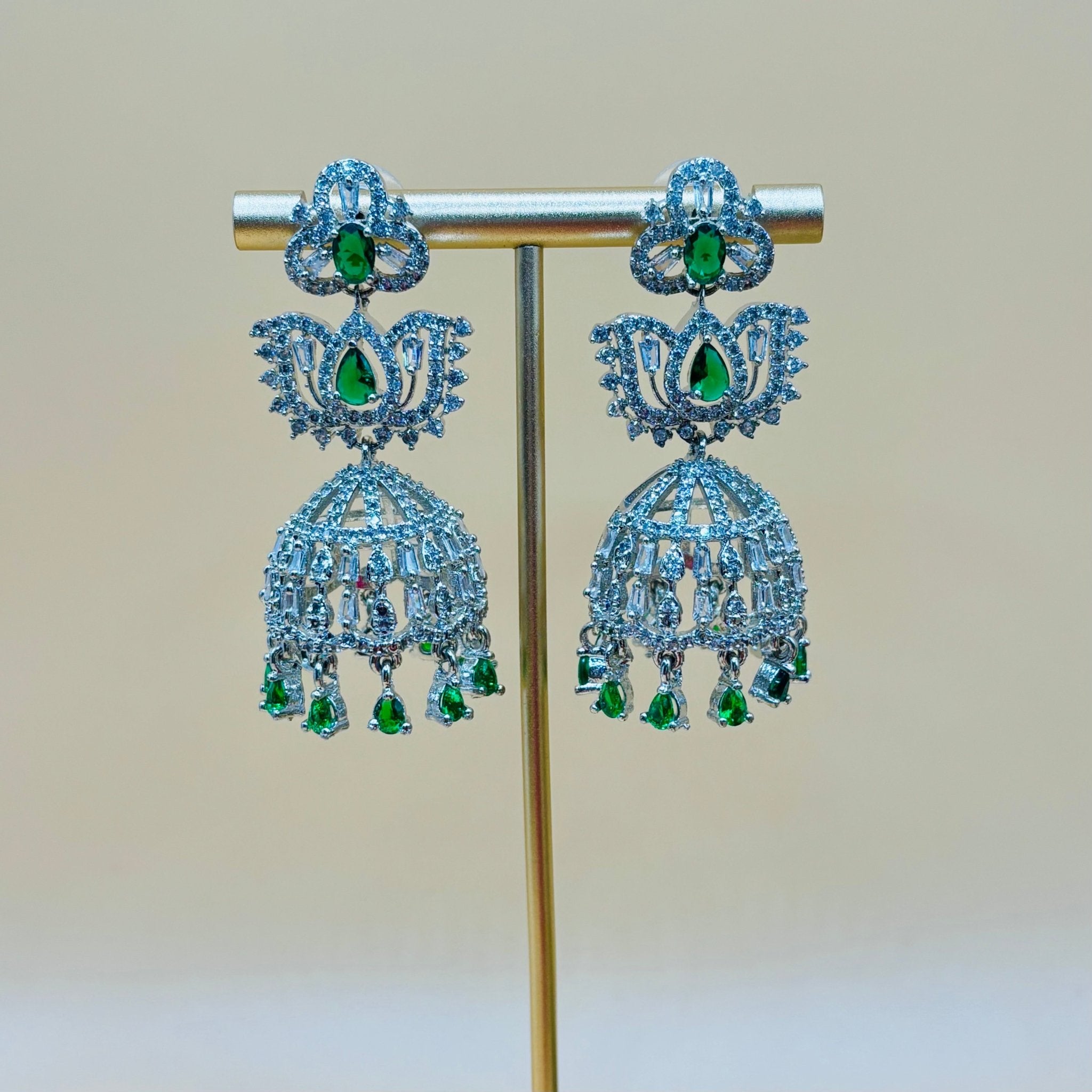 • Clothing: Embroidered/Printed suit for women - Made of best quality fabric - lawn or linen or chiffon - pure silk - Available at Najma Designs & Co. • Jewelry: Gold - plated stud earrings for