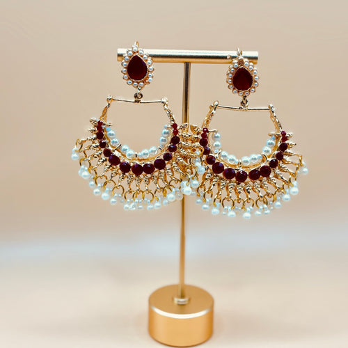 • Clothing: Embroidered/Printed suit for women - Made of best quality fabric - lawn or linen or chiffon - pure silk - Available at Najma Designs & Co. • Jewelry: Gold - plated stud earrings for