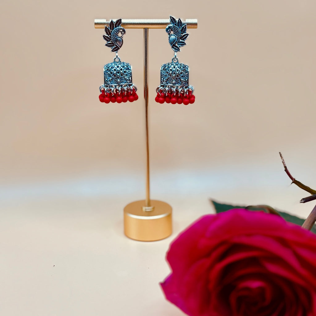 • Clothing: Embroidered/Printed suit for women - Made of best quality fabric - lawn or linen or chiffon - pure silk - Available at Najma Designs & Co. • Jewelry: Gold - plated stud earrings for