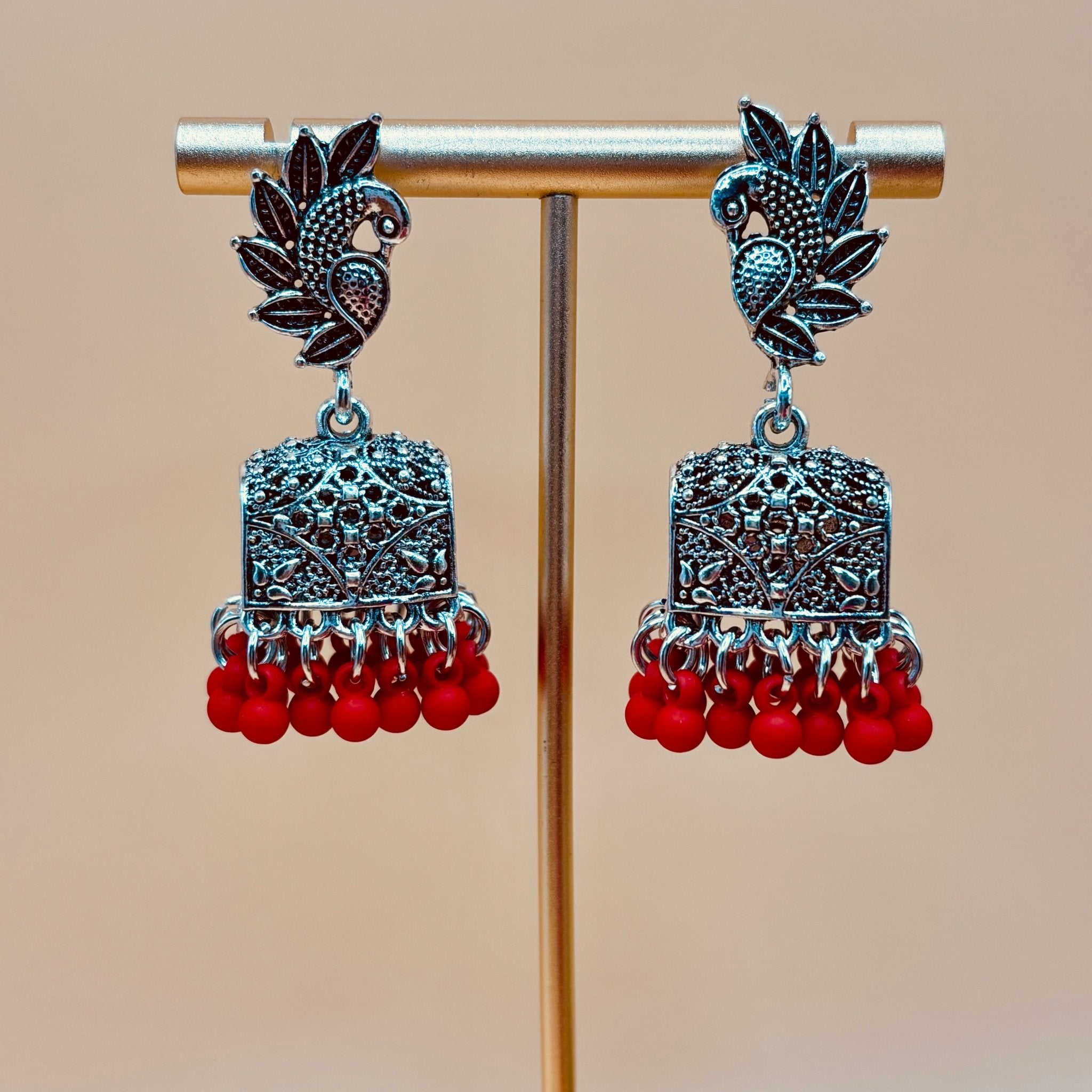 • Clothing: Embroidered/Printed suit for women - Made of best quality fabric - lawn or linen or chiffon - pure silk - Available at Najma Designs & Co. • Jewelry: Gold - plated stud earrings for