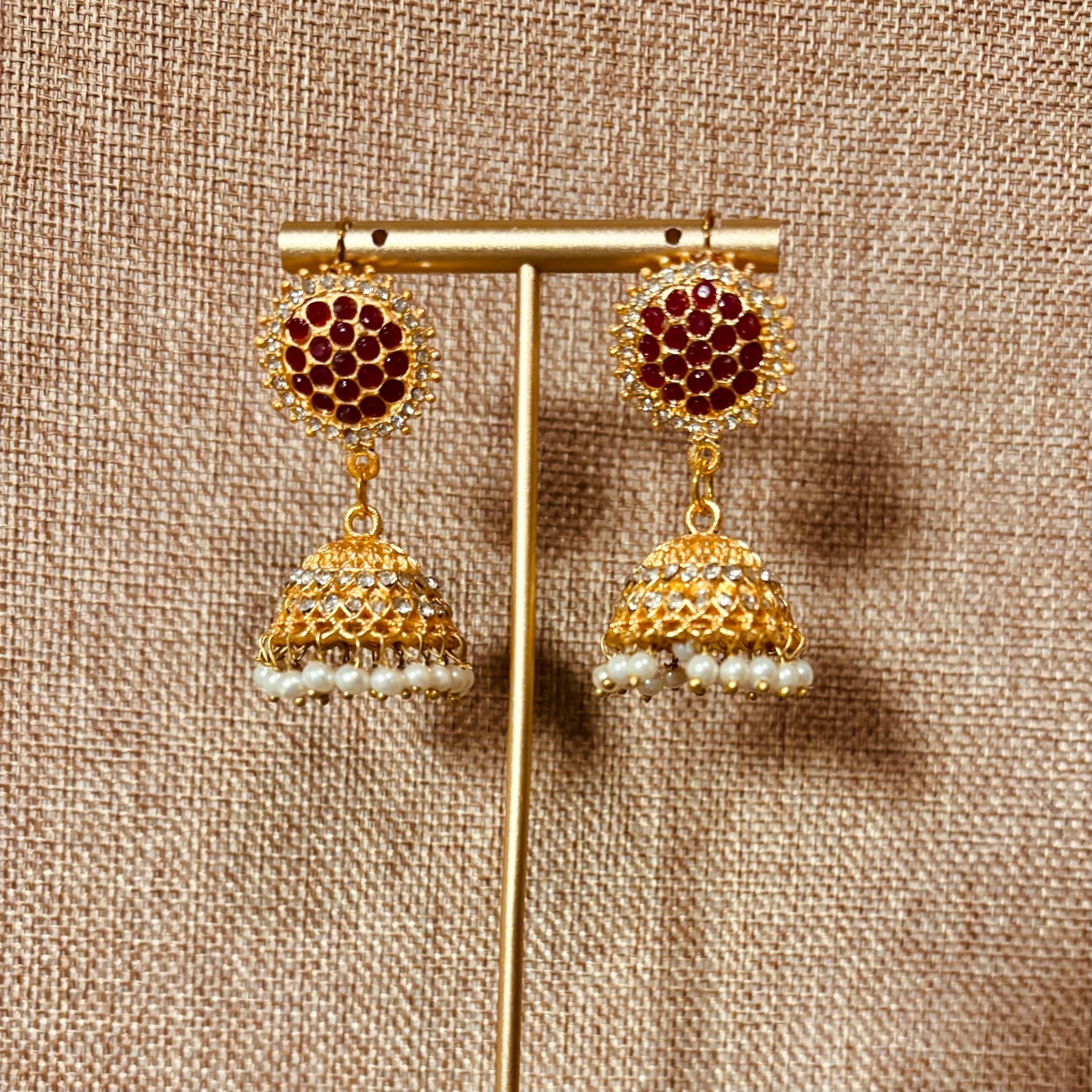 • Clothing: Embroidered/Printed suit for women - Made of best quality fabric - lawn or linen or chiffon - pure silk - Available at Najma Designs & Co. • Jewelry: Gold - plated stud earrings for