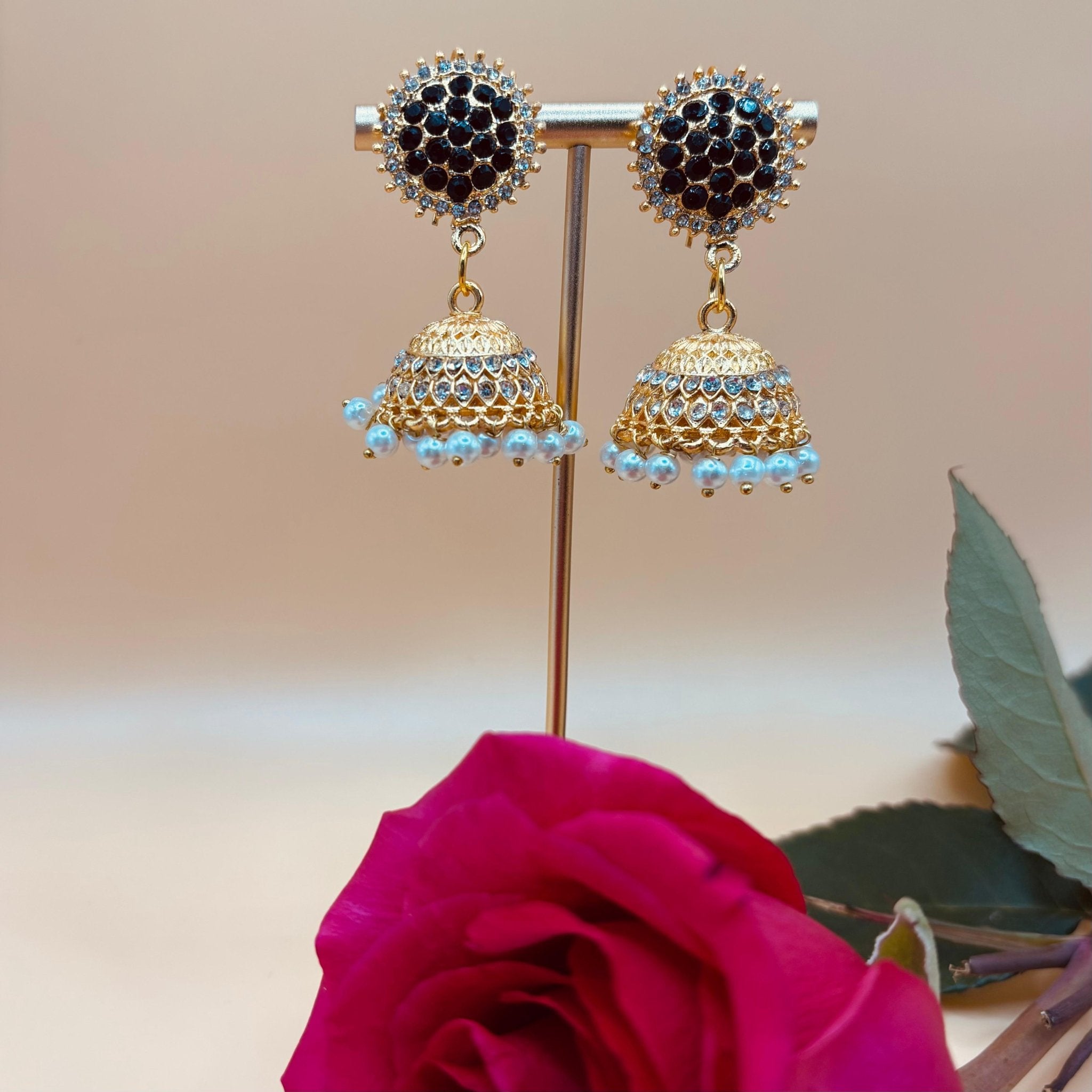 • Clothing: Embroidered/Printed suit for women - Made of best quality fabric - lawn or linen or chiffon - pure silk - Available at Najma Designs & Co. • Jewelry: Gold - plated stud earrings for