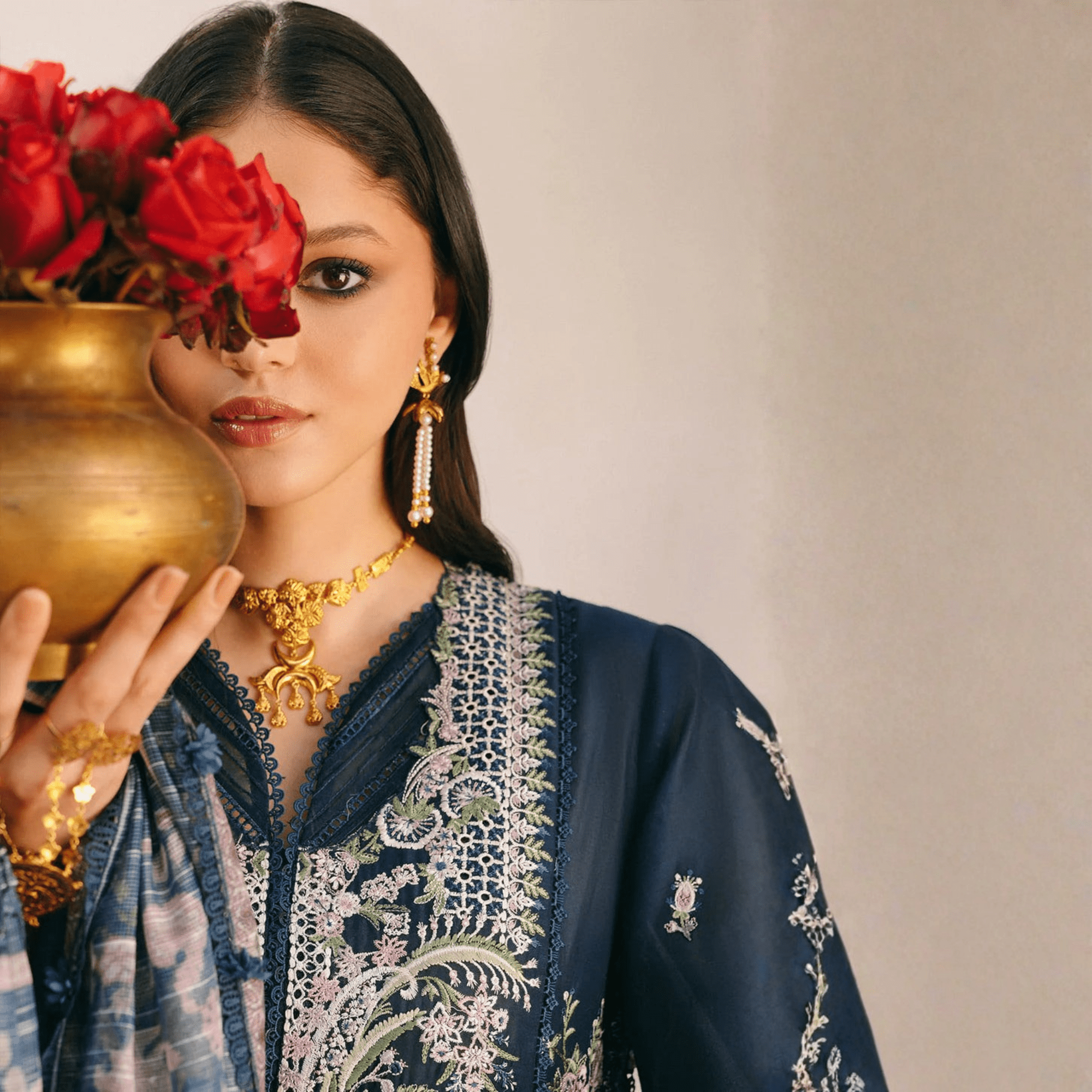 • Clothing: Embroidered/Printed suit for women - Made of best quality fabric - lawn or linen or chiffon - pure silk - Available at Najma Designs & Co. • Jewelry: Gold - plated stud earrings for