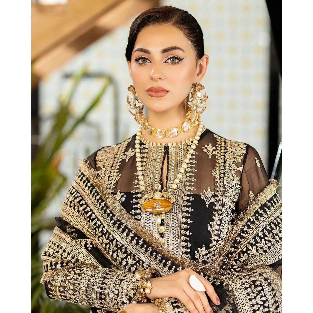 • Clothing: Embroidered/Printed suit for women - Made of best quality fabric - lawn or linen or chiffon - pure silk - Available at Najma Designs & Co. • Jewelry: Gold - plated stud earrings for