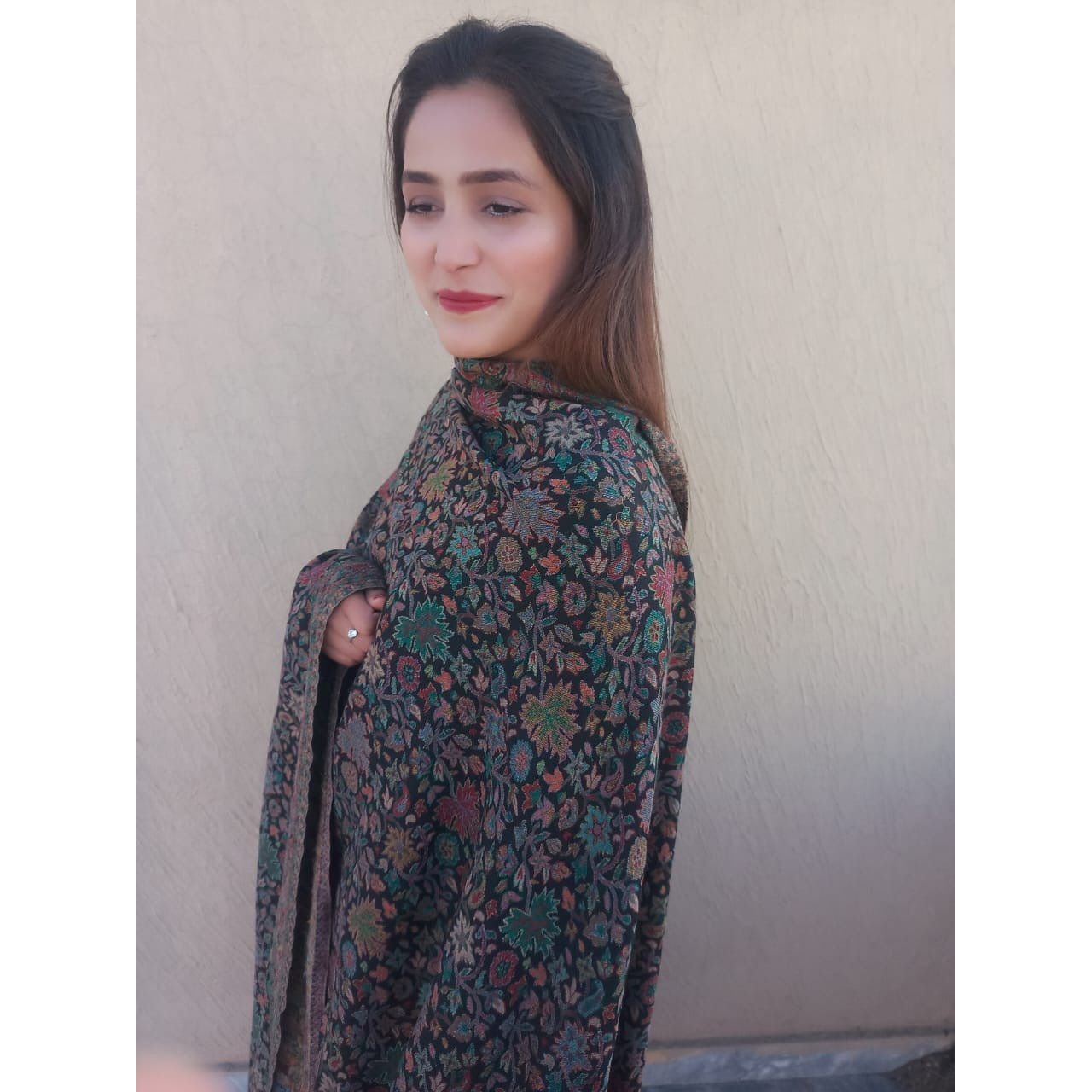 model wearing Kani Shawl Pashmina - Black Multi-color beautiful design available at najmadesigns and co. Good for winters. 