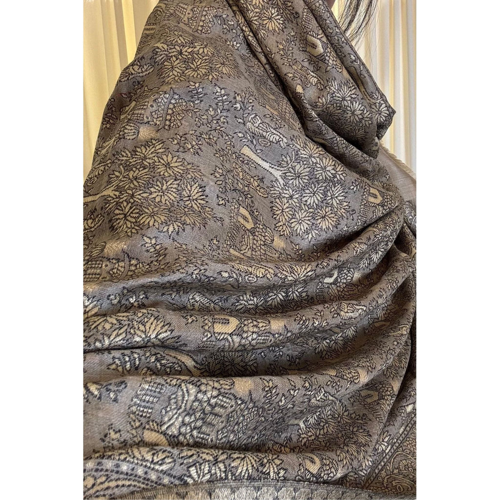 model wearing Kani Silk Pashmina Shawl (Shahi Darbar) - Beige Camel Color
Handcrafted with premium quality, this exquisite shawl is available exclusively at Najmadesigns and Co.