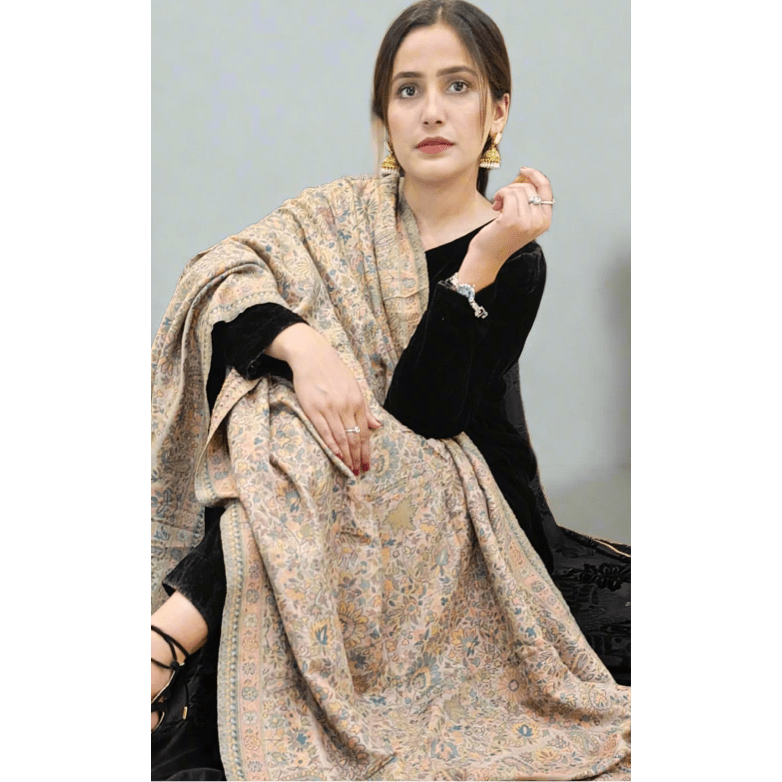 Kani Pashmina Shawl (Shahi) is a beautiful multi-colored shawl with a beige base color. It is available at Najmadesigns and Co.