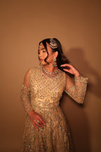 • Clothing: Embroidered/Printed suit for women - Made of best quality fabric - lawn or linen or chiffon- pure silk - Available at Najma Designs & Co. • Jewelry: Gold-plated stud earrings for