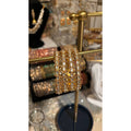 • Clothing: Embroidered/Printed suit for women - Made of best quality fabric - lawn or linen or chiffon - pure silk - Available at Najma Designs & Co. • Jewelry: Gold - plated stud earrings for