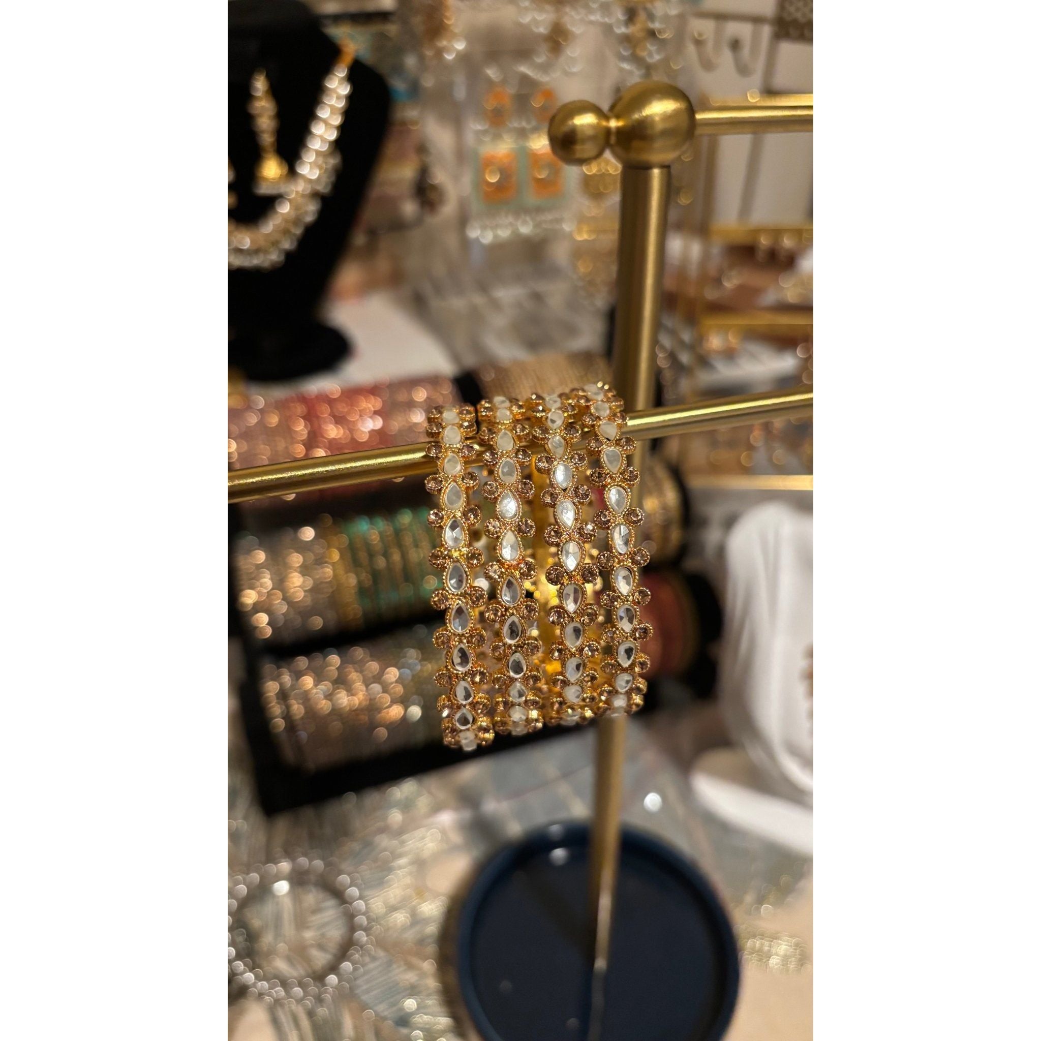 • Clothing: Embroidered/Printed suit for women - Made of best quality fabric - lawn or linen or chiffon - pure silk - Available at Najma Designs & Co. • Jewelry: Gold - plated stud earrings for