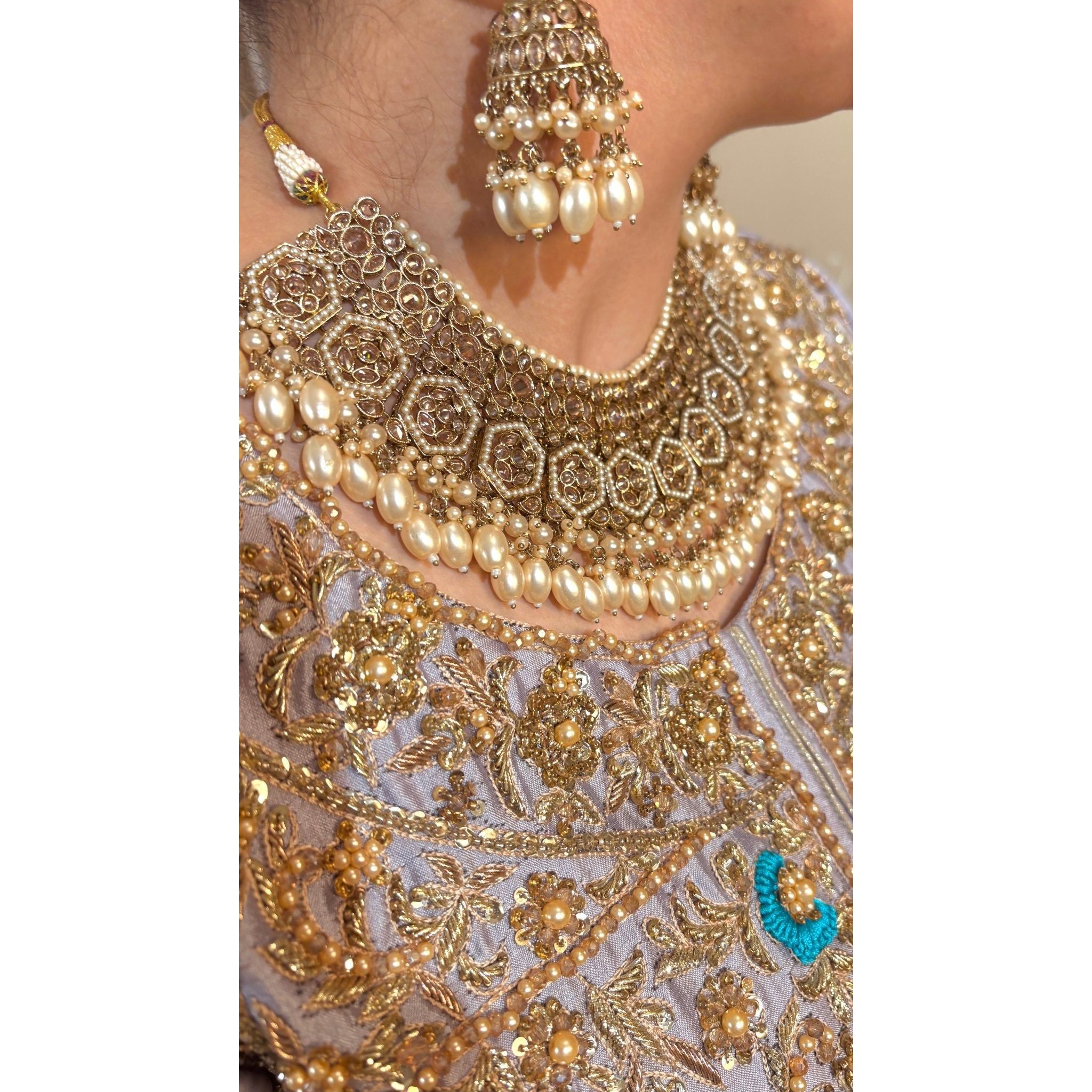 • Clothing: Embroidered/Printed suit for women - Made of best quality fabric - lawn or linen or chiffon - pure silk - Available at Najma Designs & Co. • Jewelry: Gold - plated stud earrings for