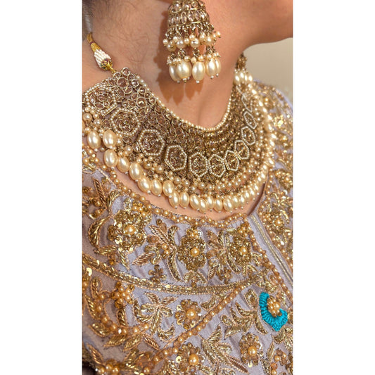 • Clothing: Embroidered/Printed suit for women - Made of best quality fabric - lawn or linen or chiffon - pure silk - Available at Najma Designs & Co. • Jewelry: Gold - plated stud earrings for