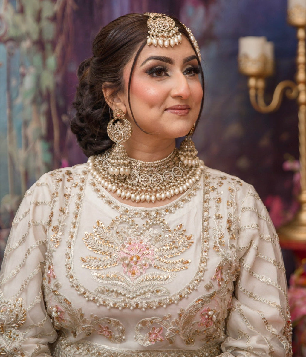 • Clothing: Embroidered/Printed suit for women - Made of best quality fabric - lawn or linen or chiffon - pure silk - Available at Najma Designs & Co. • Jewelry: Gold - plated stud earrings for