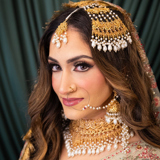 • Clothing: Embroidered/Printed suit for women - Made of best quality fabric - lawn or linen or chiffon - pure silk - Available at Najma Designs & Co. • Jewelry: Gold - plated stud earrings for