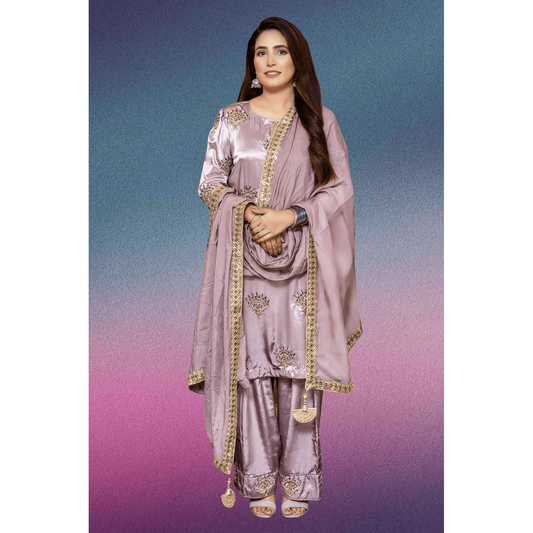 Lavender silk suit with hand embroidery of Motti and Cut Dana. It’s very comfortable outfit and comes with traditional shalwar. perfect for traditional and formal wear.
