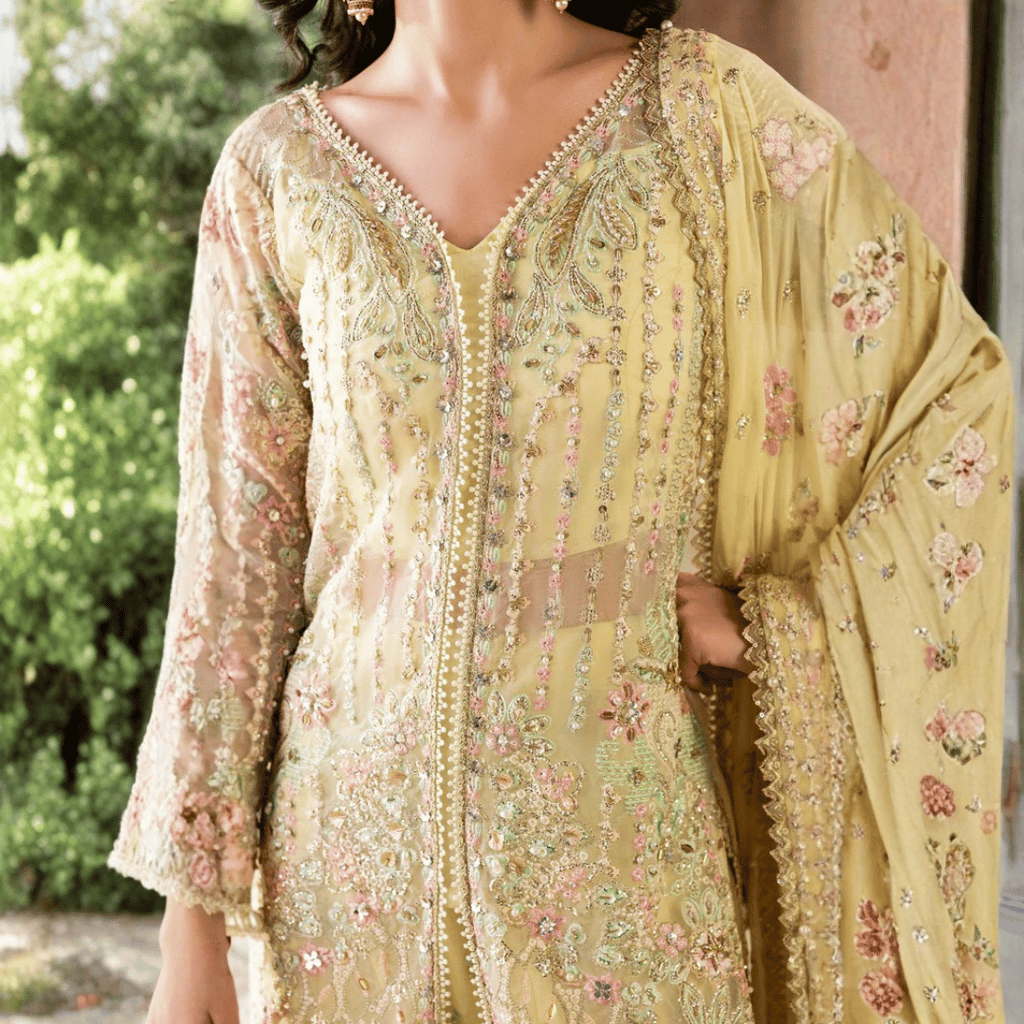 • Clothing: Embroidered/Printed suit for women - Made of best quality fabric - lawn or linen or chiffon - pure silk - Available at Najma Designs & Co. • Jewelry: Gold - plated stud earrings for