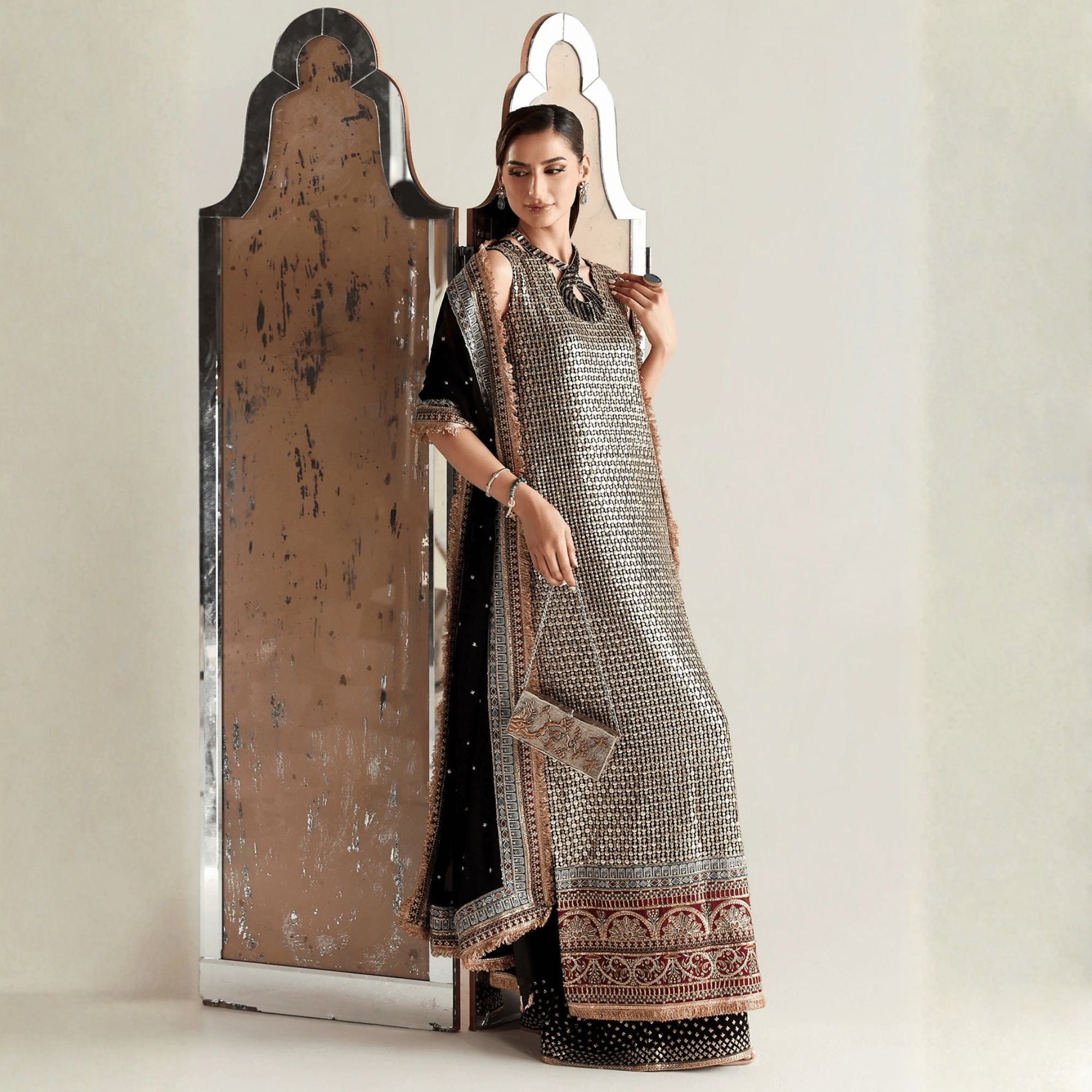 • Clothing: Embroidered/Printed suit for women - Made of best quality fabric - lawn or linen or chiffon - pure silk - Available at Najma Designs & Co. • Jewelry: Gold - plated stud earrings for
