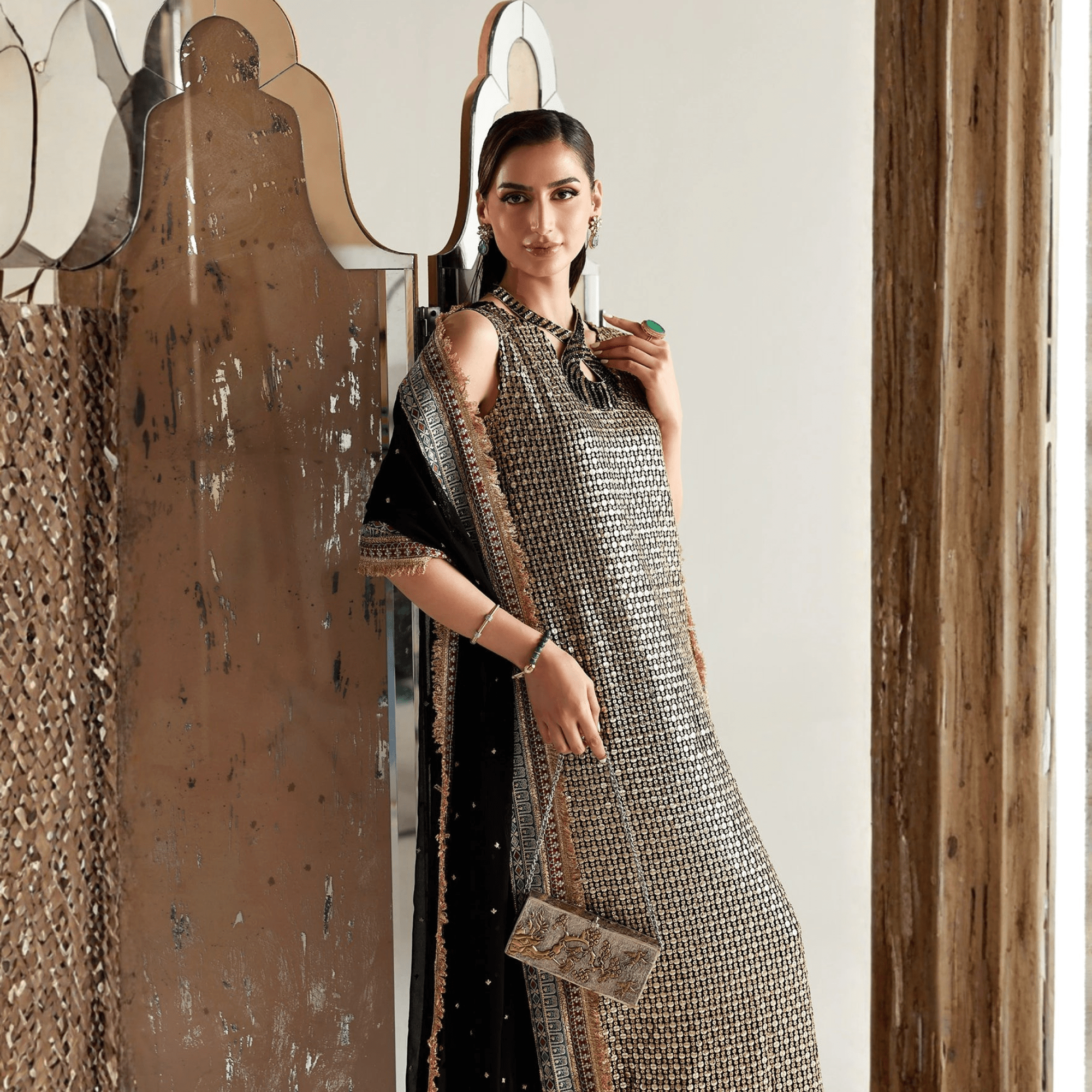 • Clothing: Embroidered/Printed suit for women - Made of best quality fabric - lawn or linen or chiffon - pure silk - Available at Najma Designs & Co. • Jewelry: Gold - plated stud earrings for
