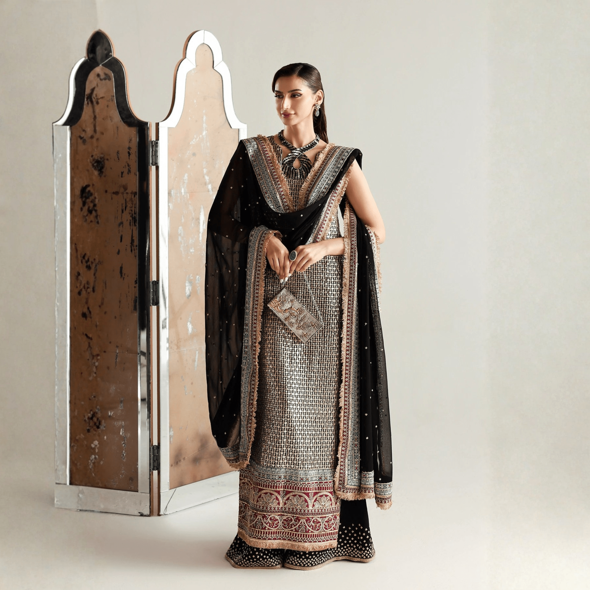 • Clothing: Embroidered/Printed suit for women - Made of best quality fabric - lawn or linen or chiffon - pure silk - Available at Najma Designs & Co. • Jewelry: Gold - plated stud earrings for